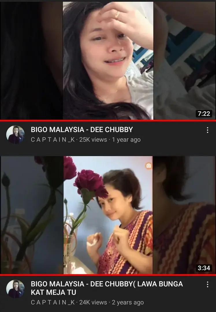 Dee Bigo, a curvy Asian woman with braces and long black hair, posing with flowers and talking to the camera.