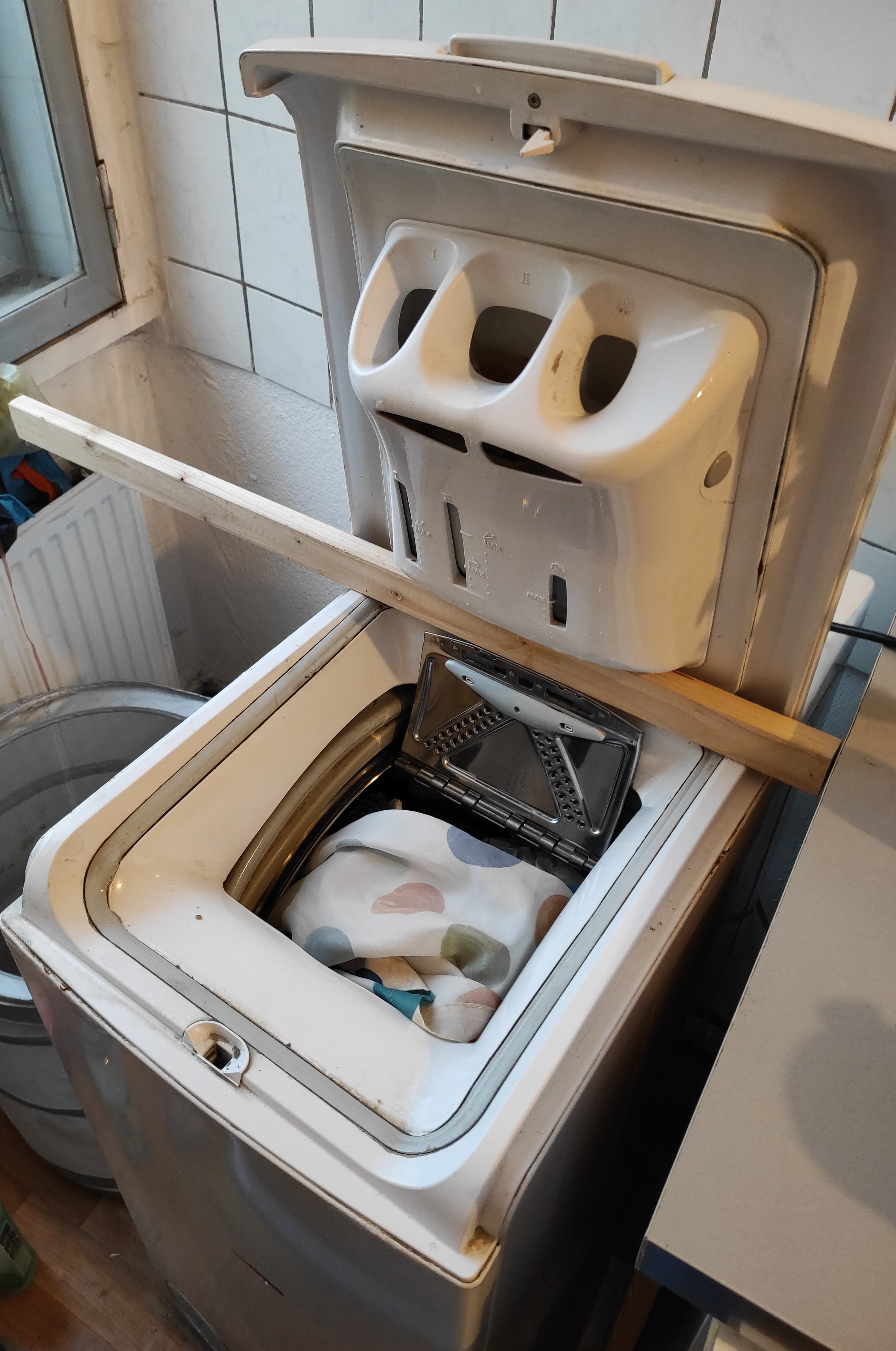 Door springs worn out and top loader door won't stay open? Not on my