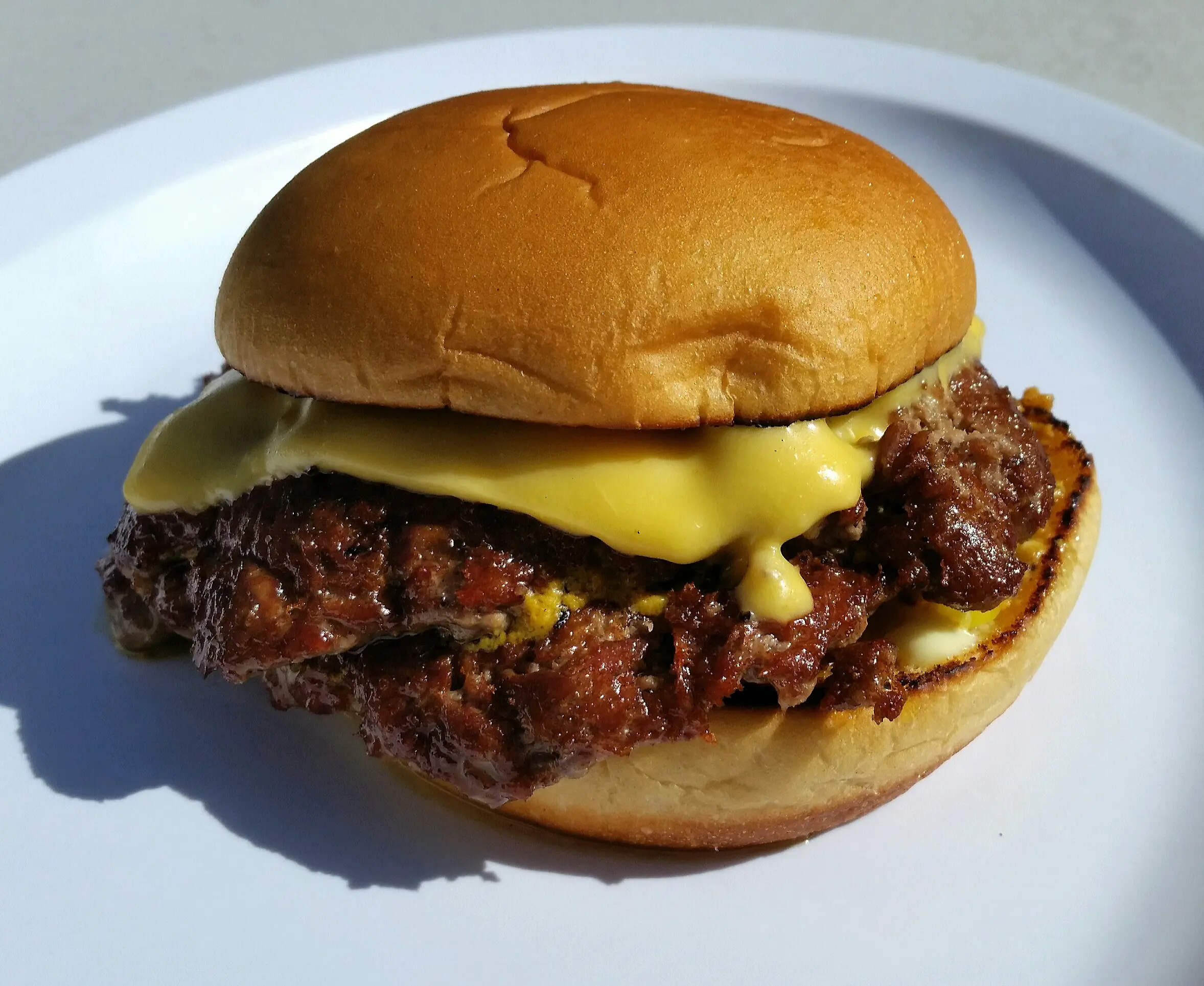 Double brisket thick smash on Martin's