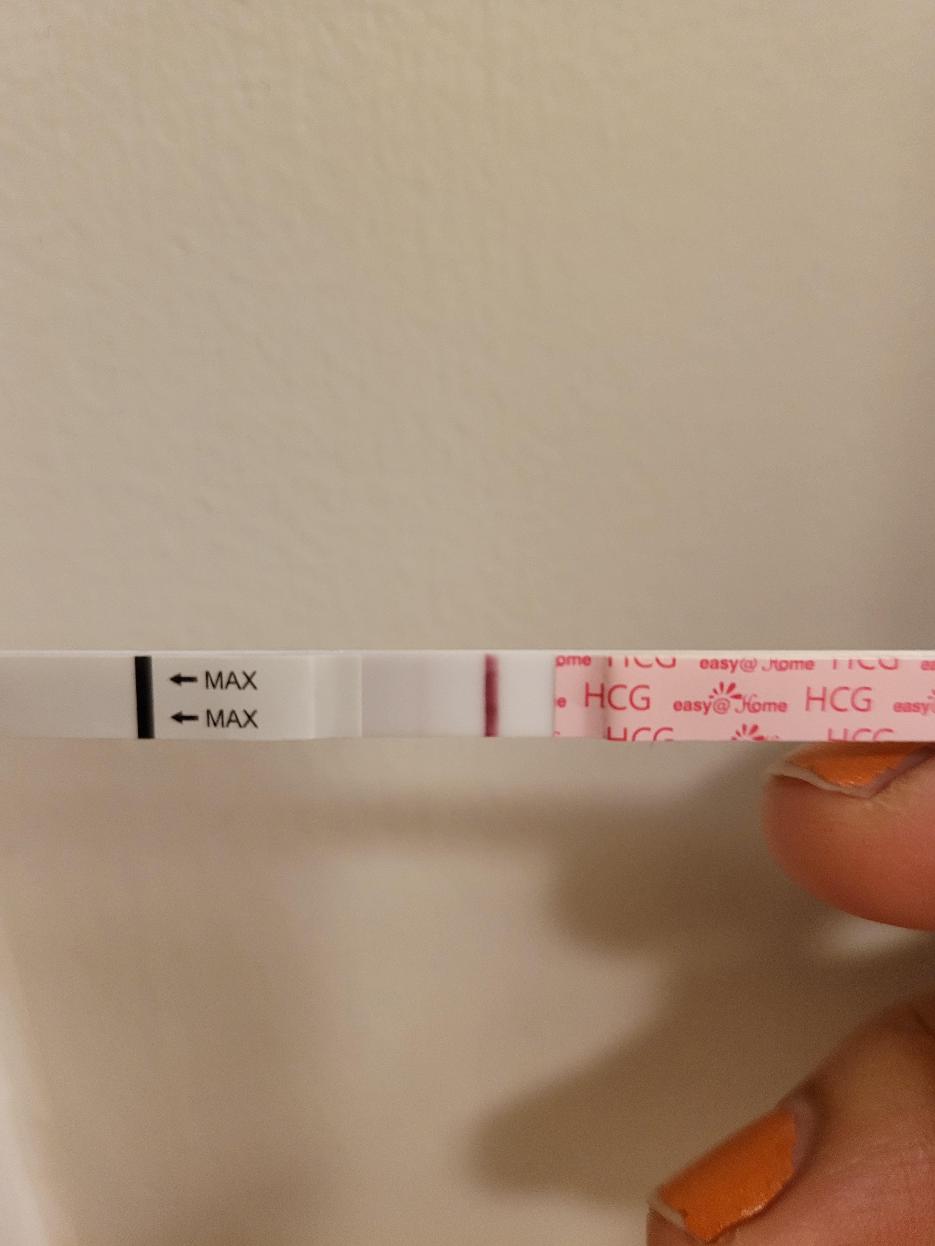 Faint line? Just took a hcg test Scrolller