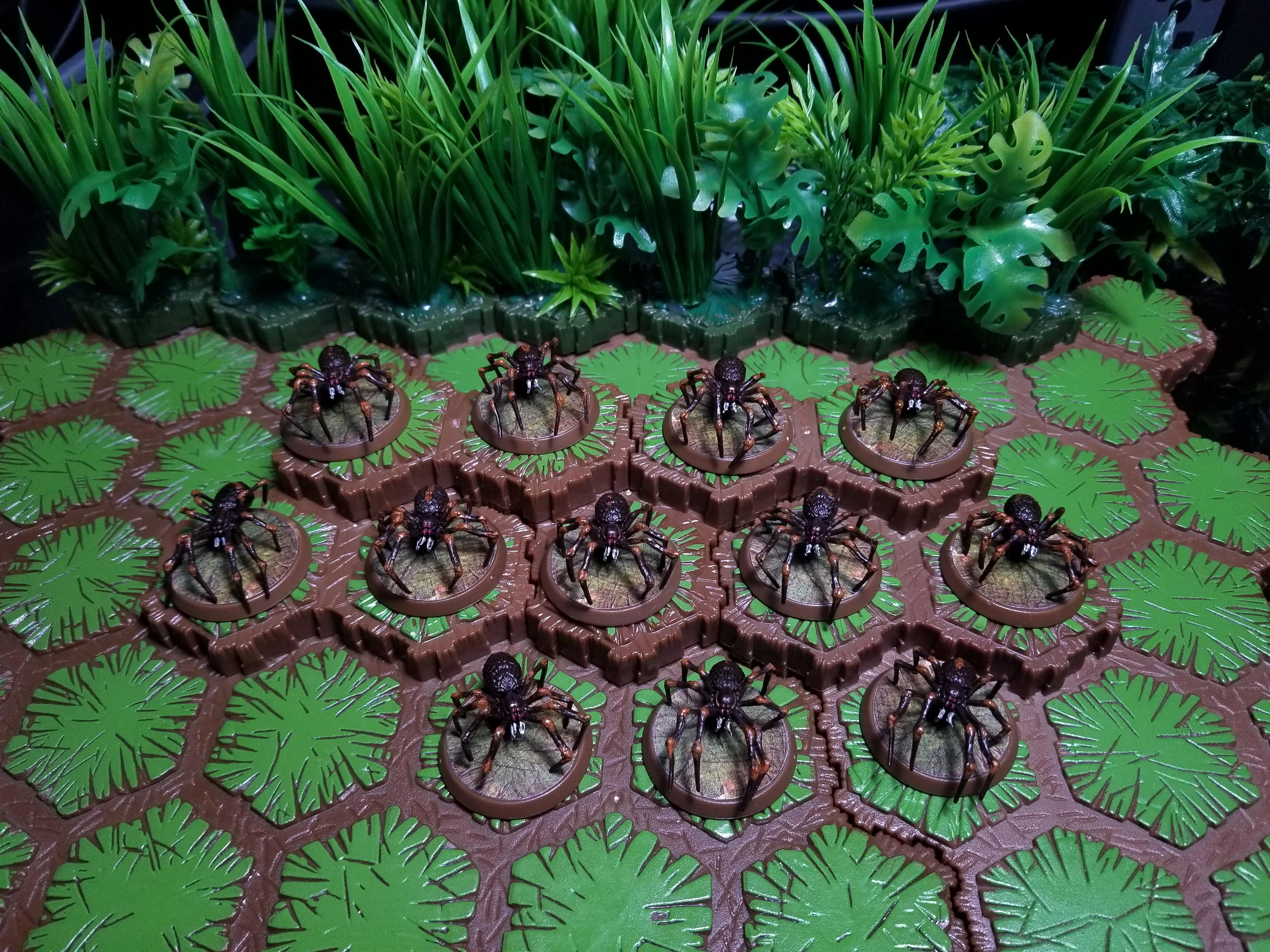 First time painting miniatures! Decided to make my own jungle terrain