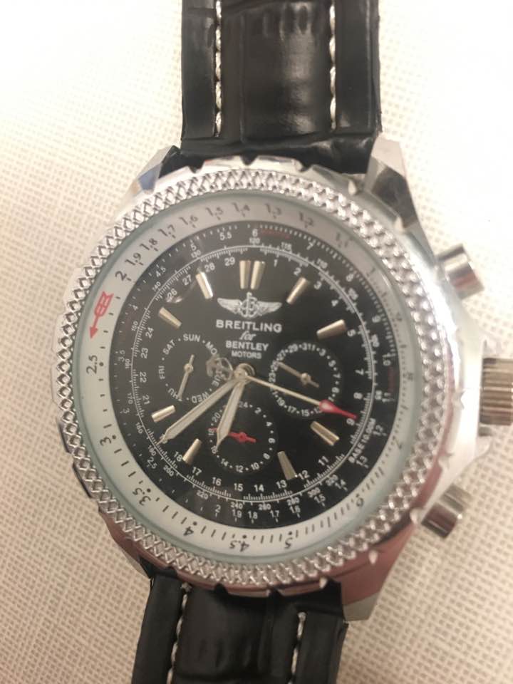 Help me identify my dads old watch scrolller