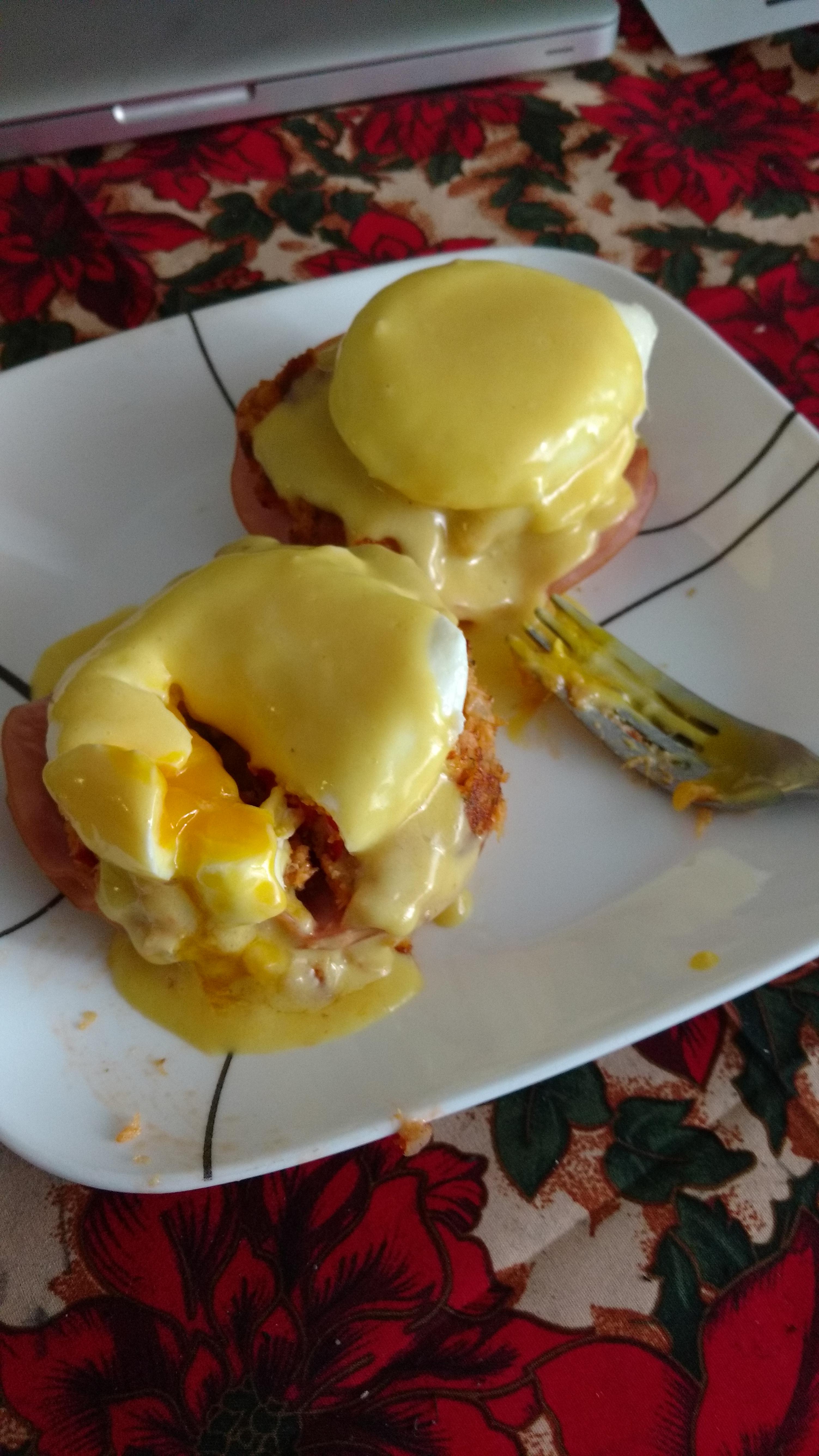 {homemade} eggs Benedict with crab cakes and ham slice on English