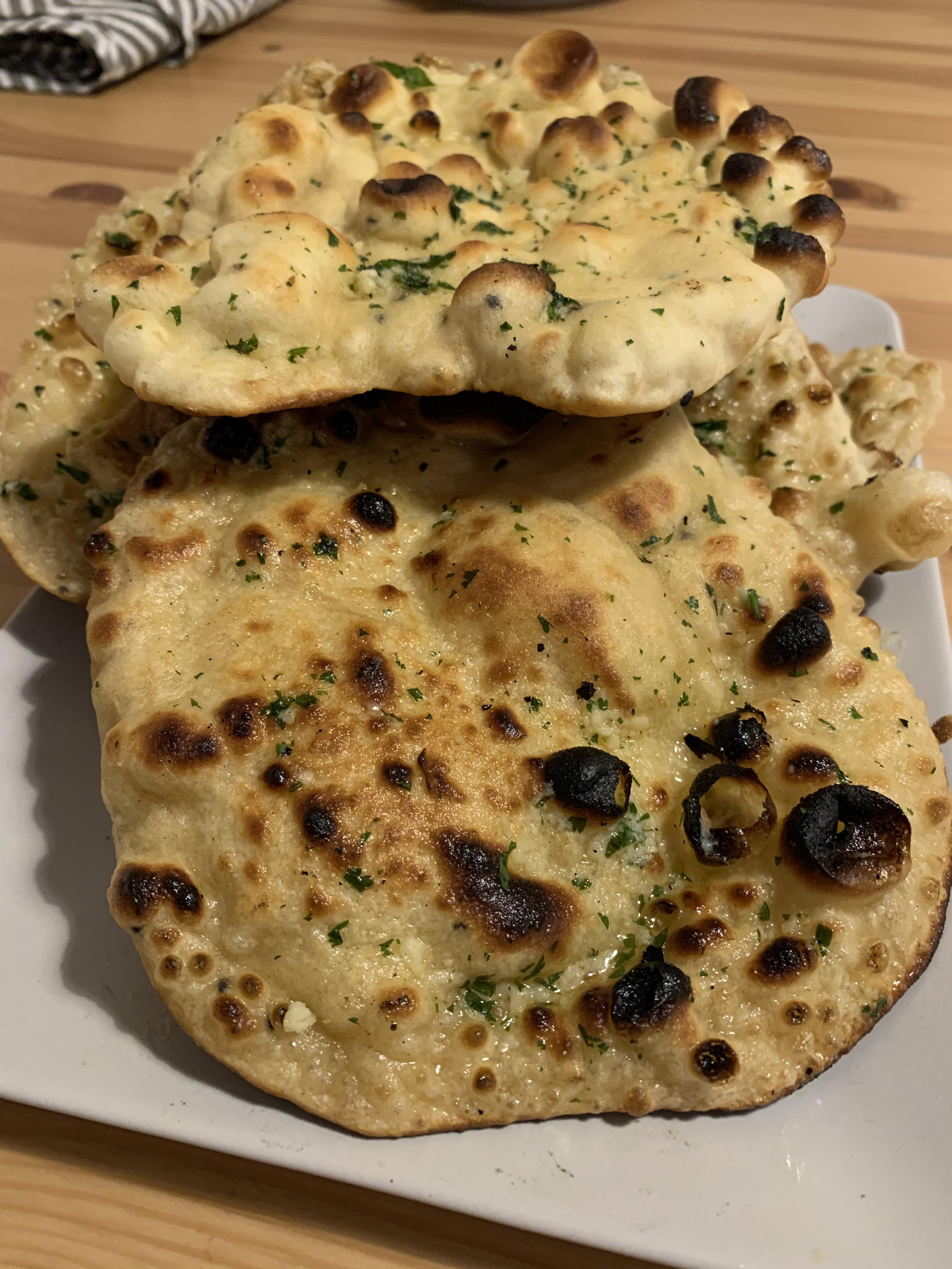 Homemade garlic and coriander naan Scrolller
