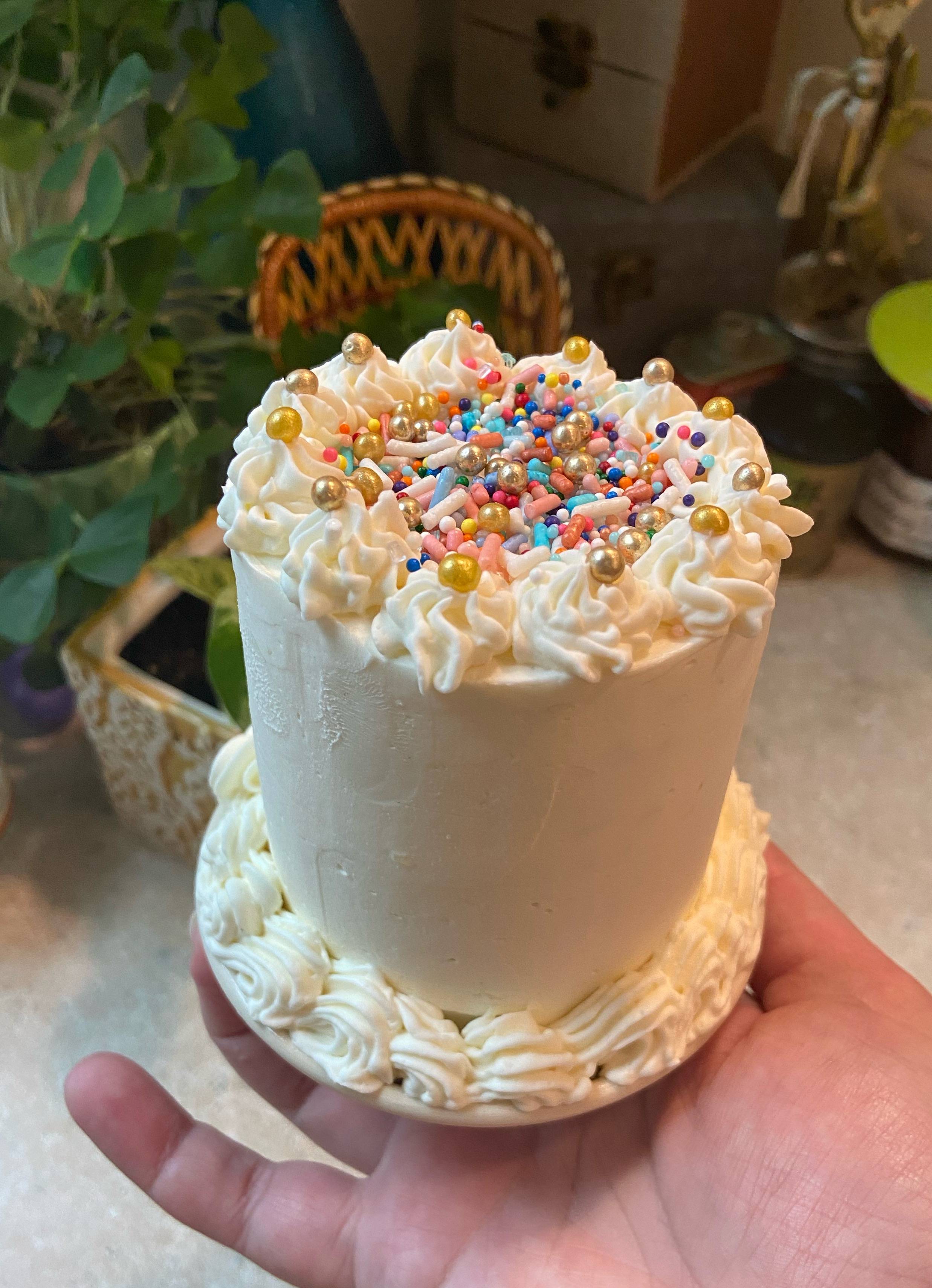 I made a mini funfetti birthday cake (with swiss meringue buttercream