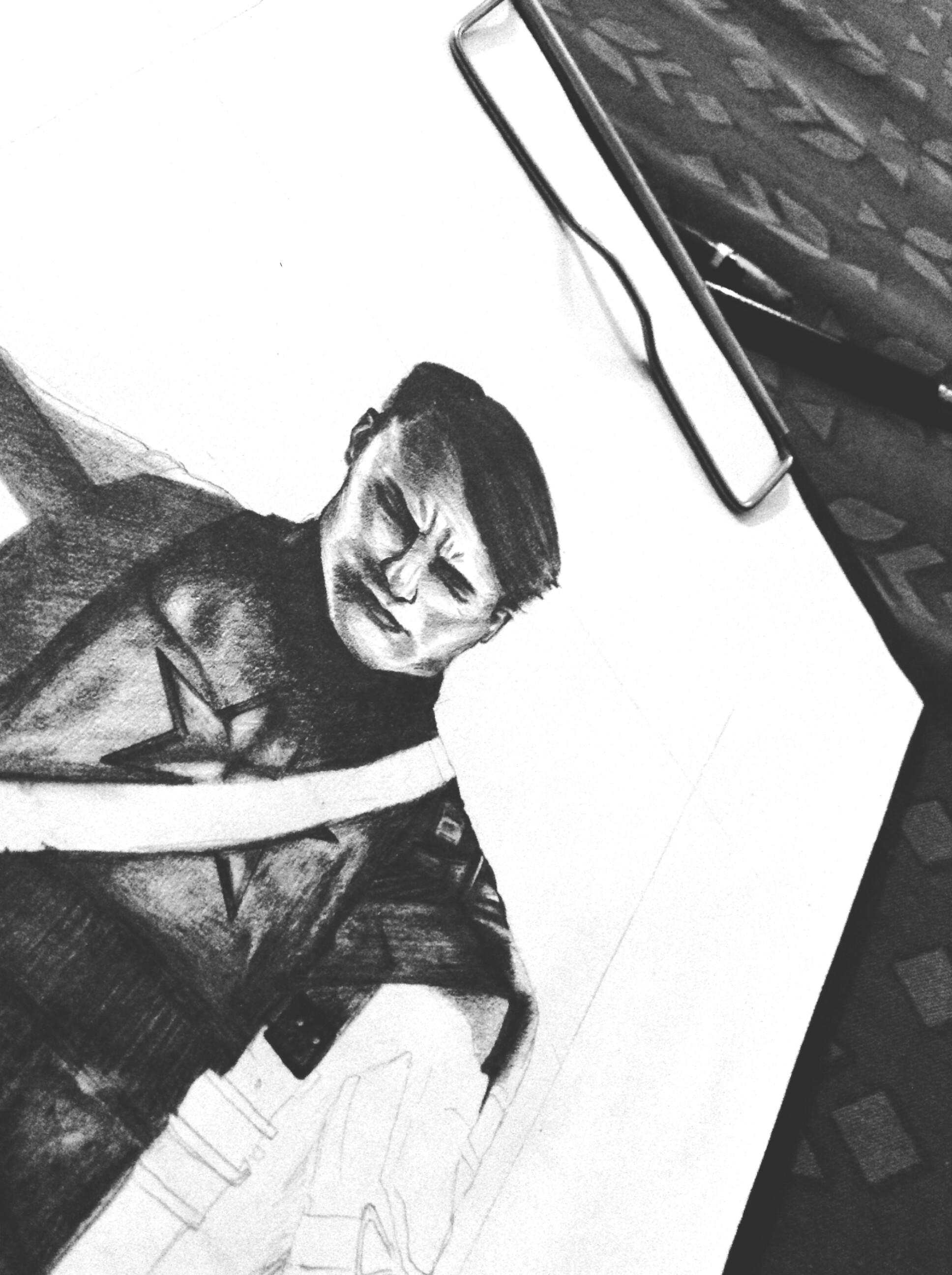 I made this pencil sketch of Captain America. Later spilled water on it