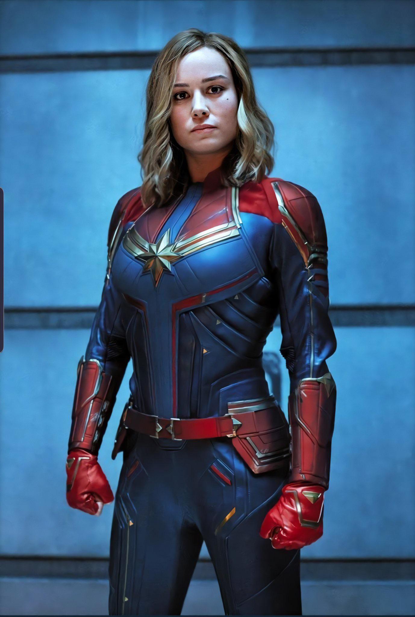 I want Brie Larson, in her full Captain Marvel costume, to give my cock ...