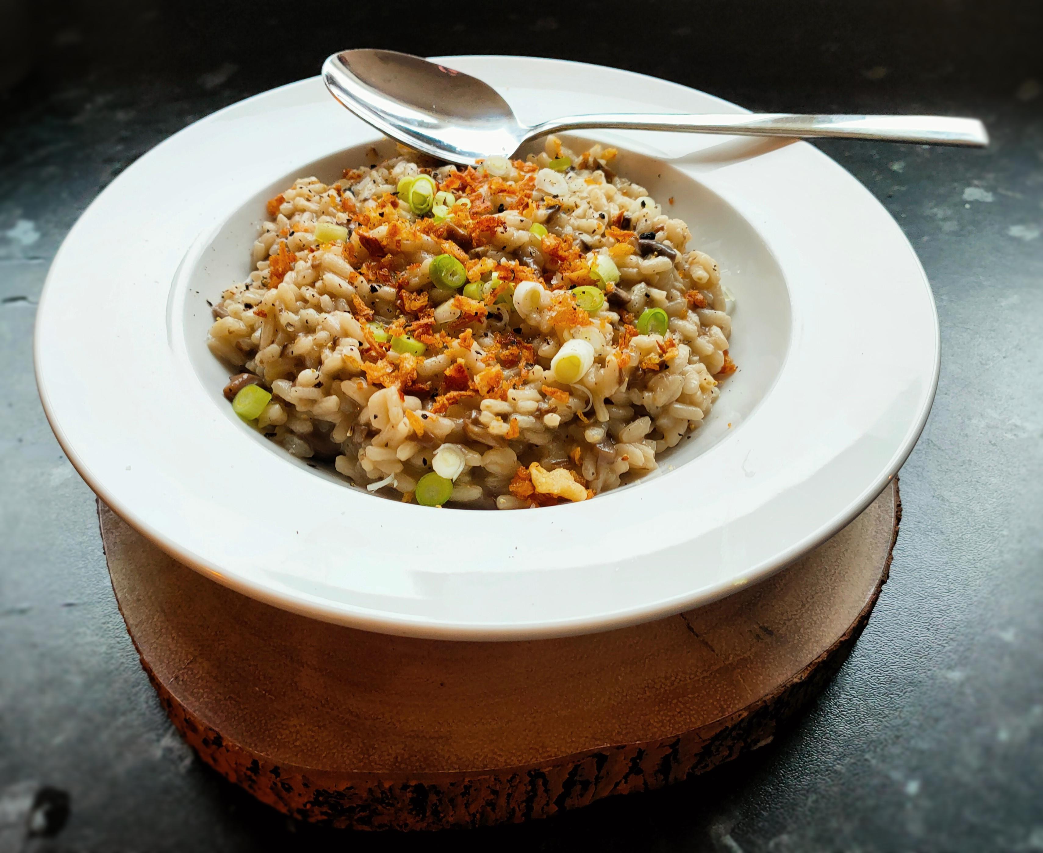 Mushroom Risotto with fresh spring onion and crispy onion garnish ...