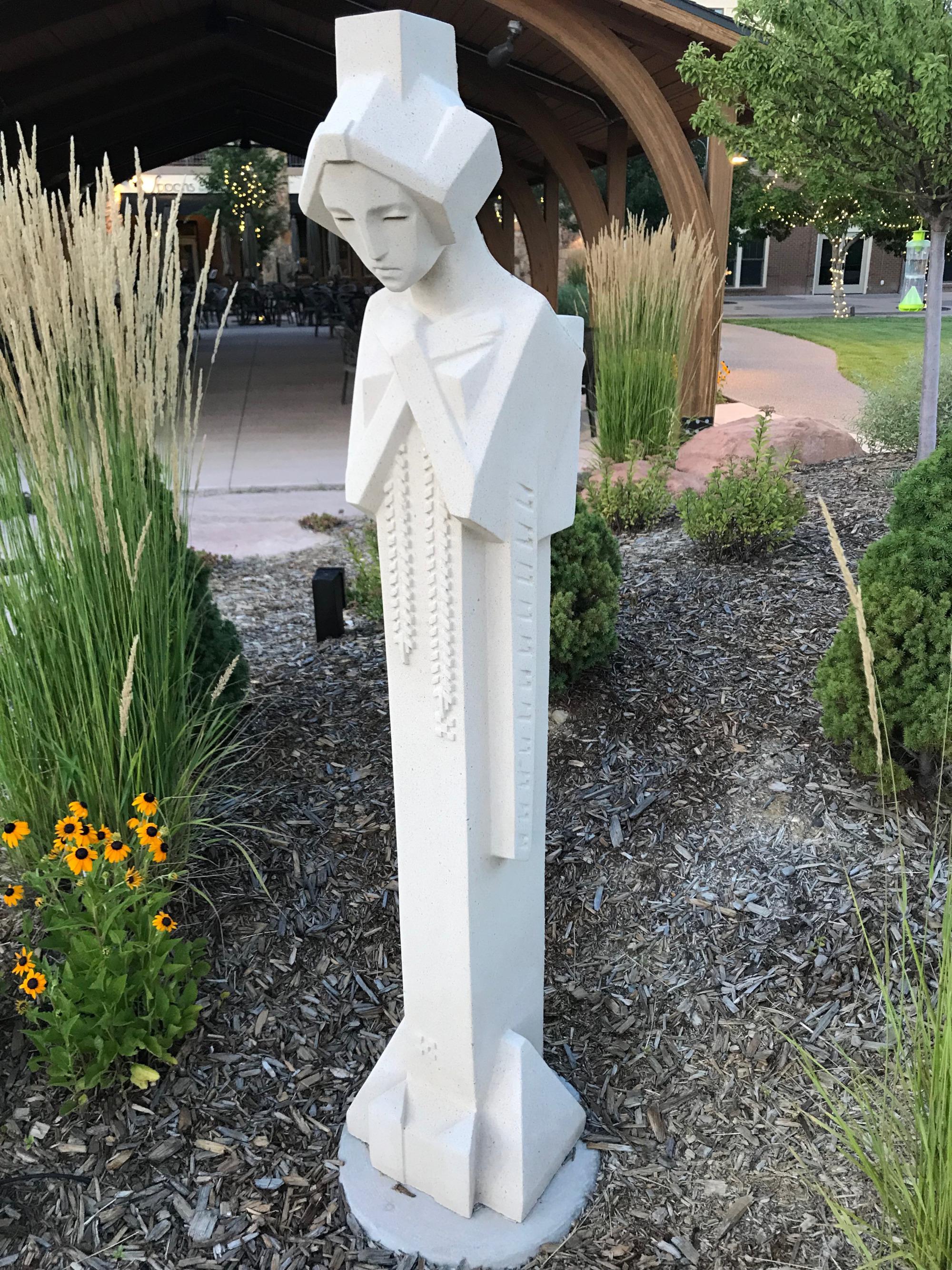 mysterious statue at Spoons Bistro and Bakery in Grand Junction, CO Scrolller