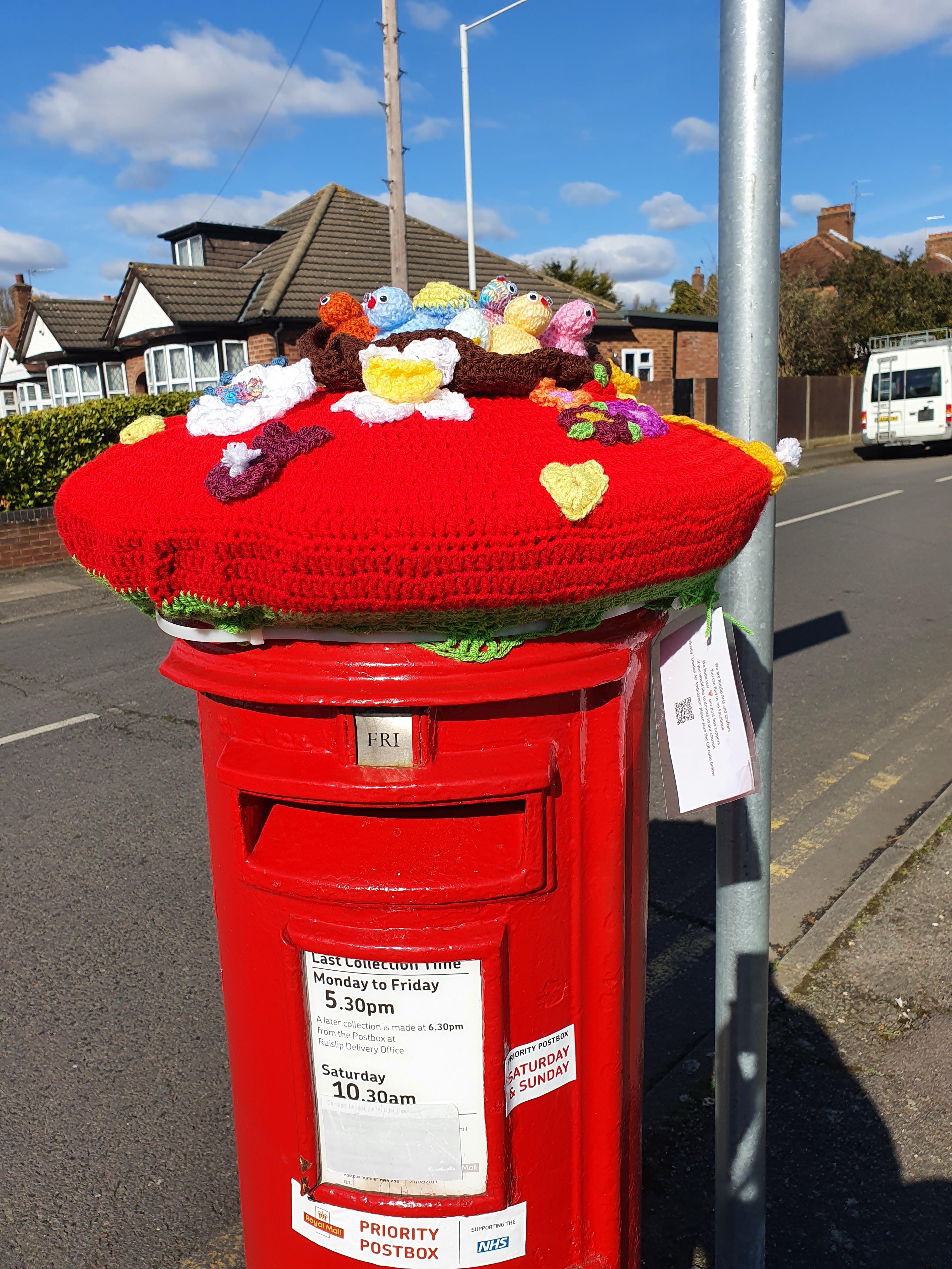 Post box feeling cute with its knitted hat | Scrolller