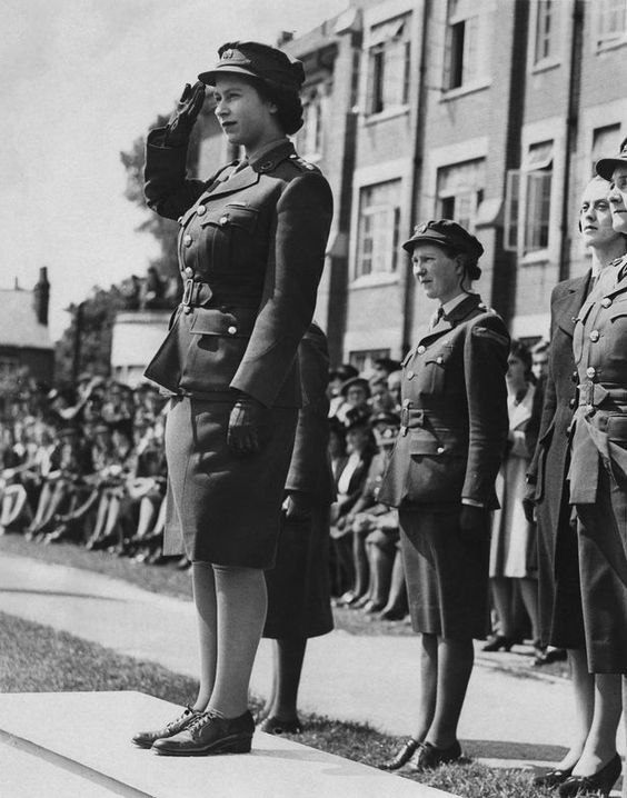 Princess Elizabeth (now Queen Elizabeth II) takes the salute during a ...