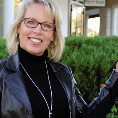 Sexy blonde mature in glasses & black leather jacket. | Scrolller