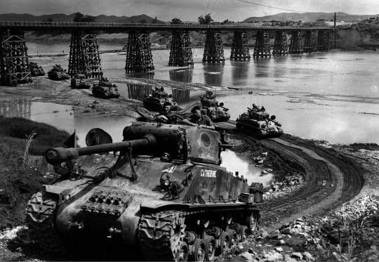 Sherman tanks of Lord Strathcona's Horse climb out of the Imjin River ...