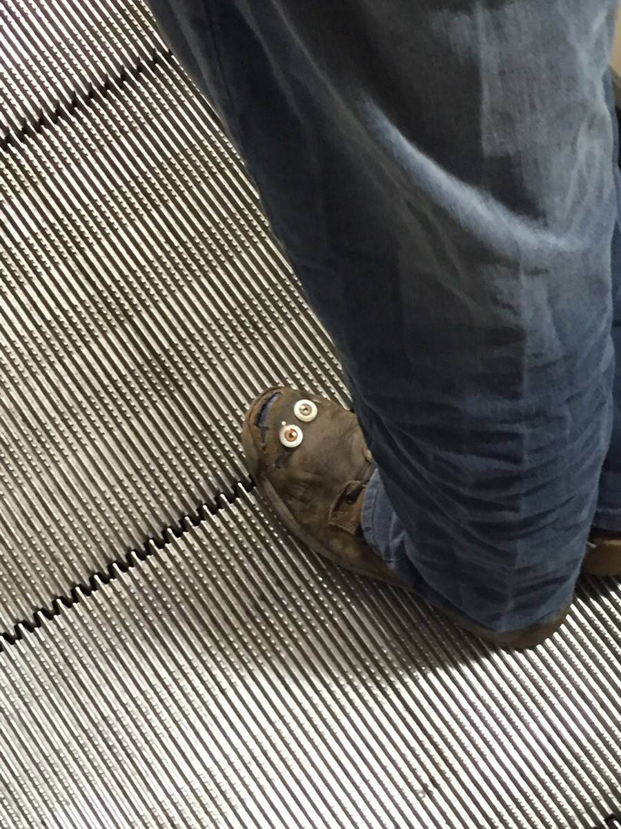 shoe on face