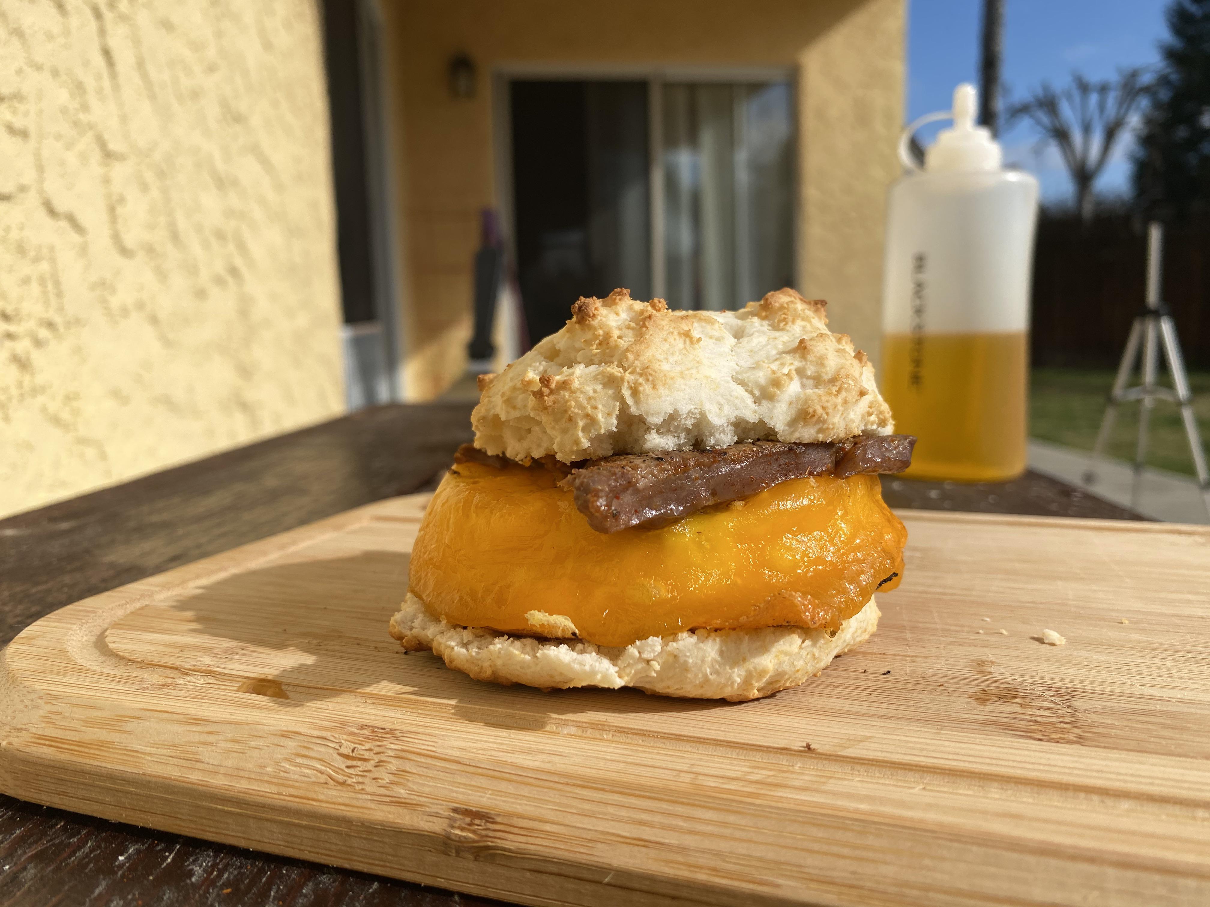 Steak and egg biscuit with cheddar cheese Scrolller