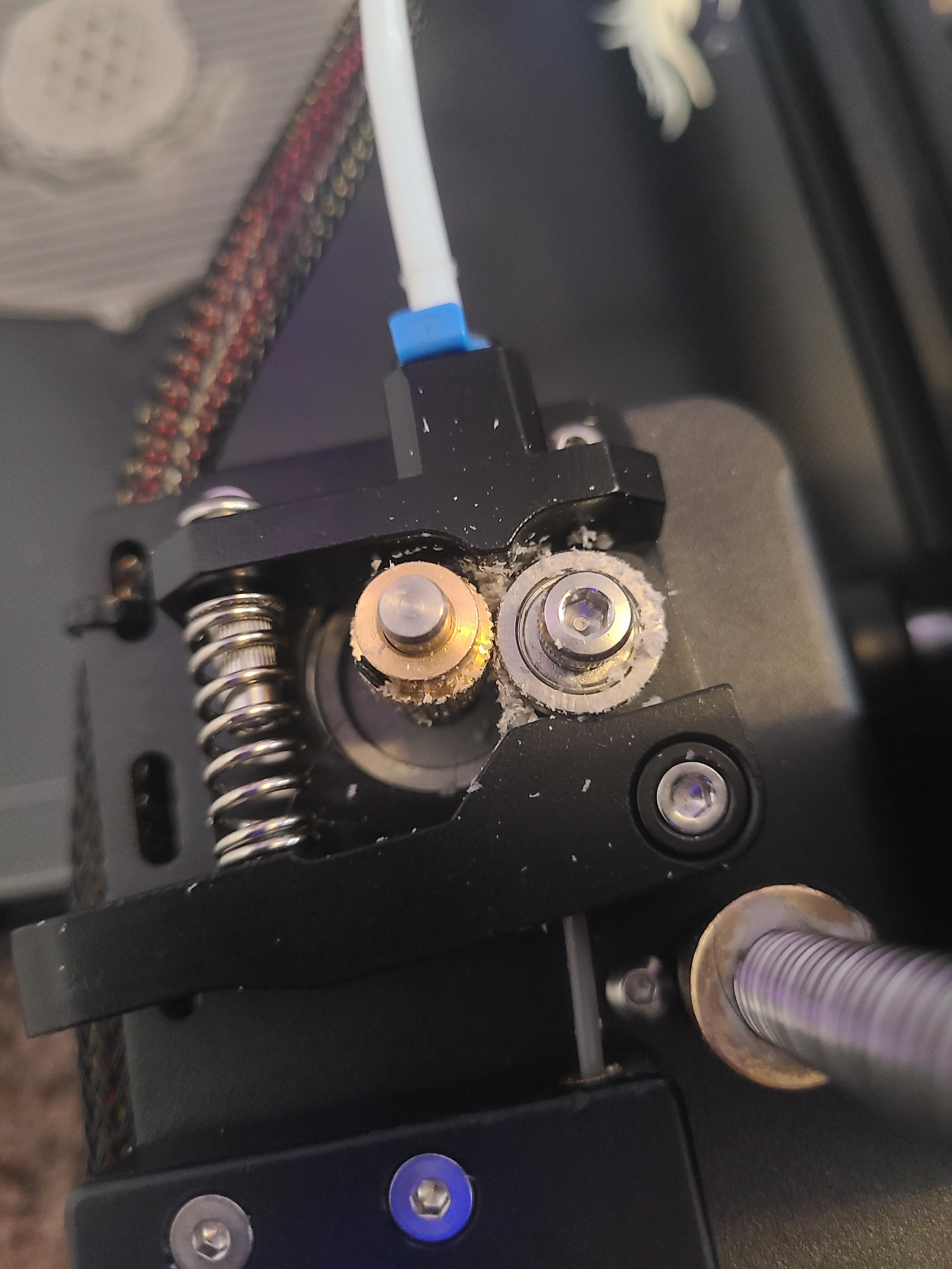 The motor keeps grinding up and breaking my filament line right here. Why? How do I fix it