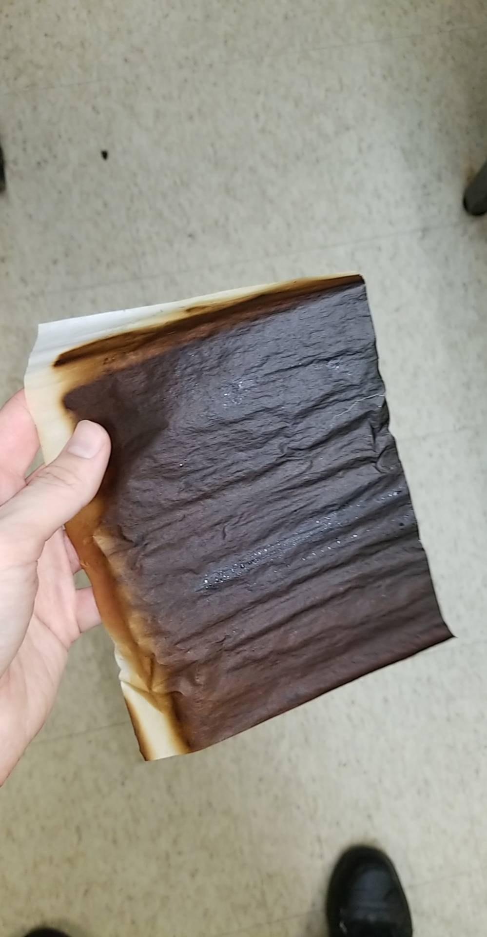 The result of accidentally leaving parchment paper on the grill for an