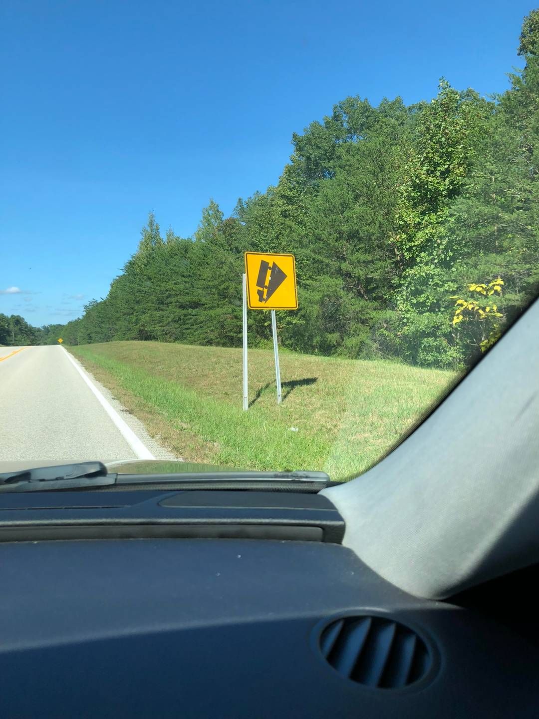 Sharp Incliine Sign This “steep incline sign” fell and it makes it look like a “vertical ...