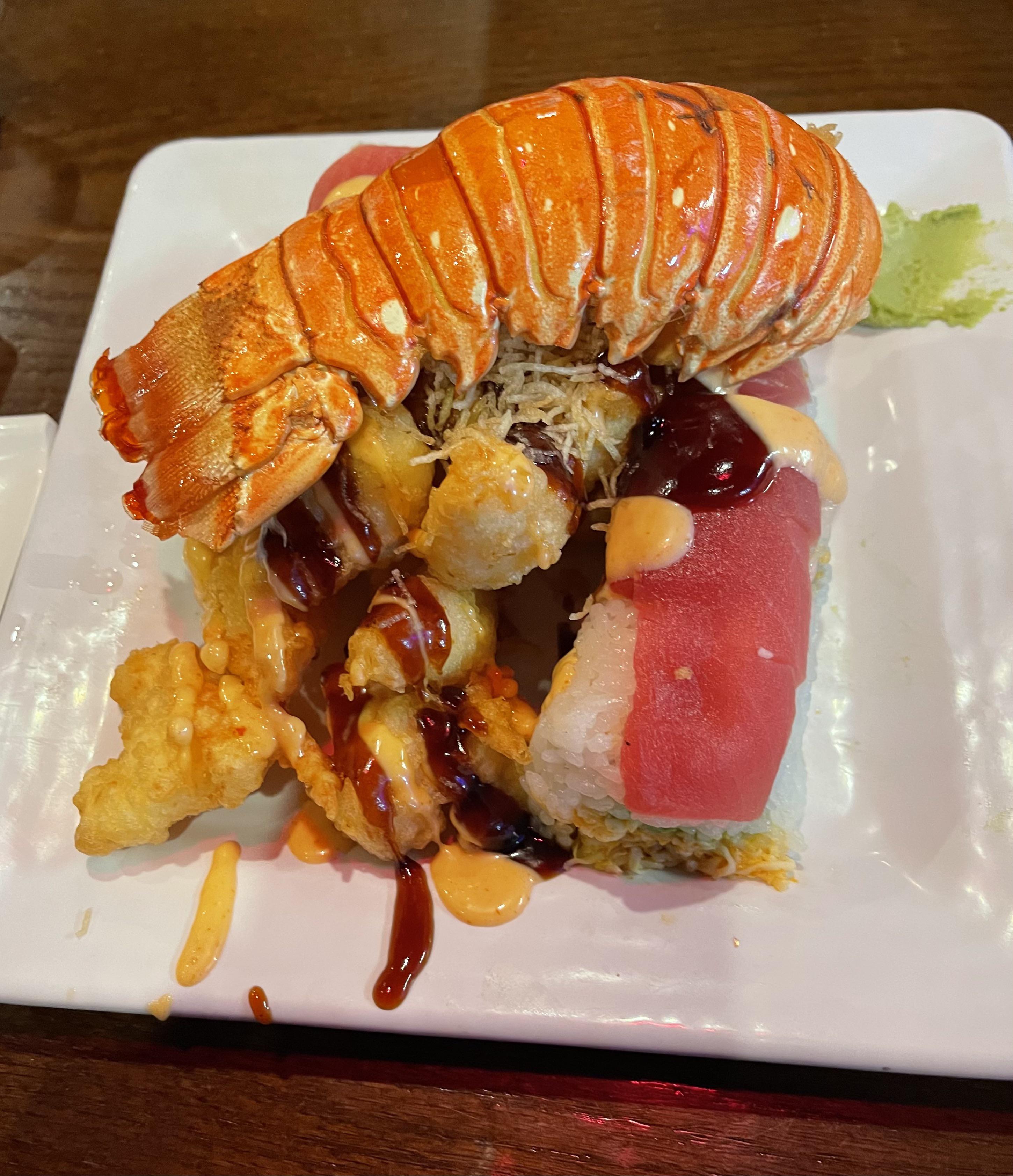 [We ate] Premium lobster roll Deep fried lobster with spicy crab and avocado topped with tuna