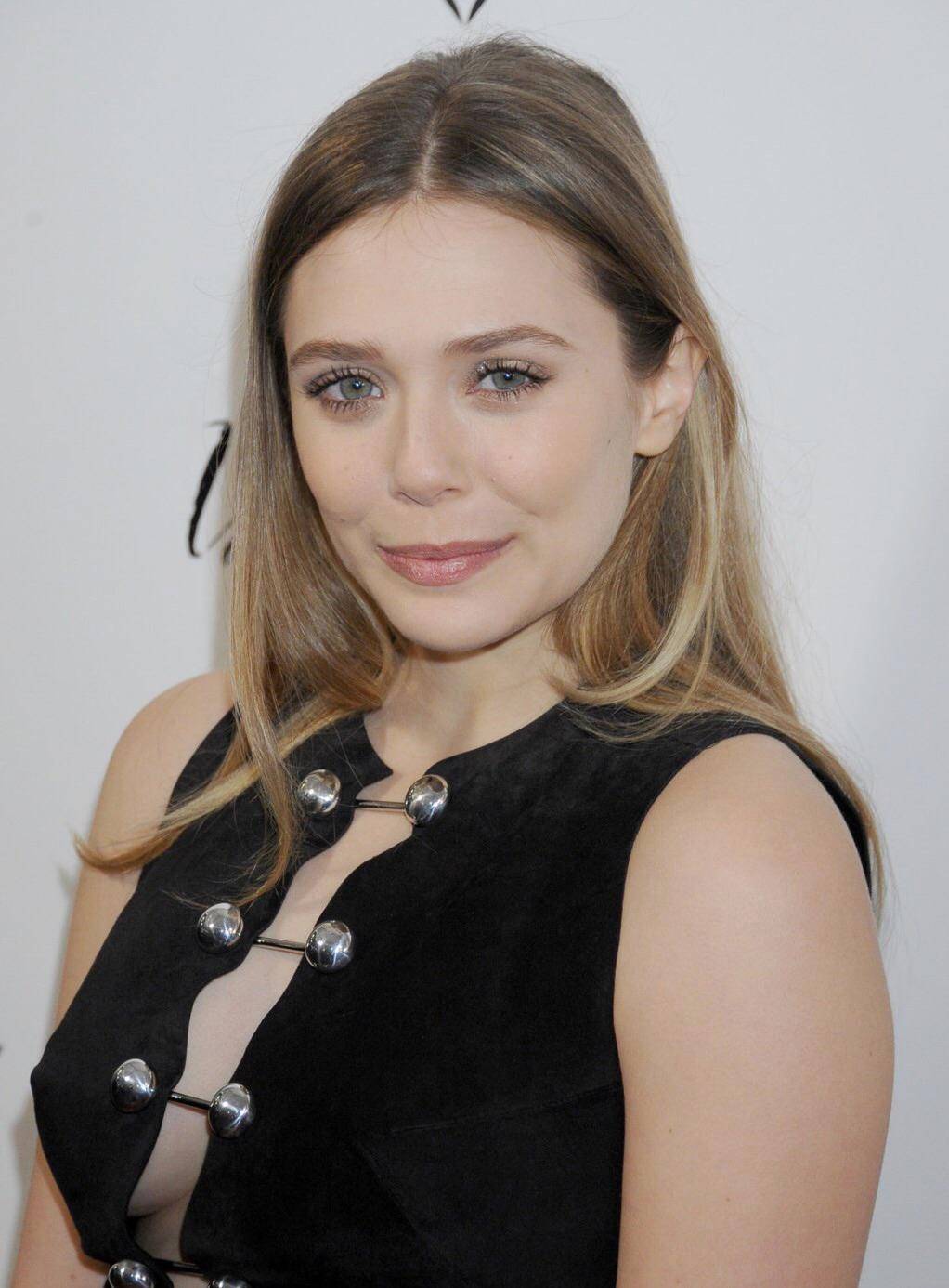 Elizabeth Olsen | ‘In Secret’ LA Premiere 6th February 2014 | Scrolller