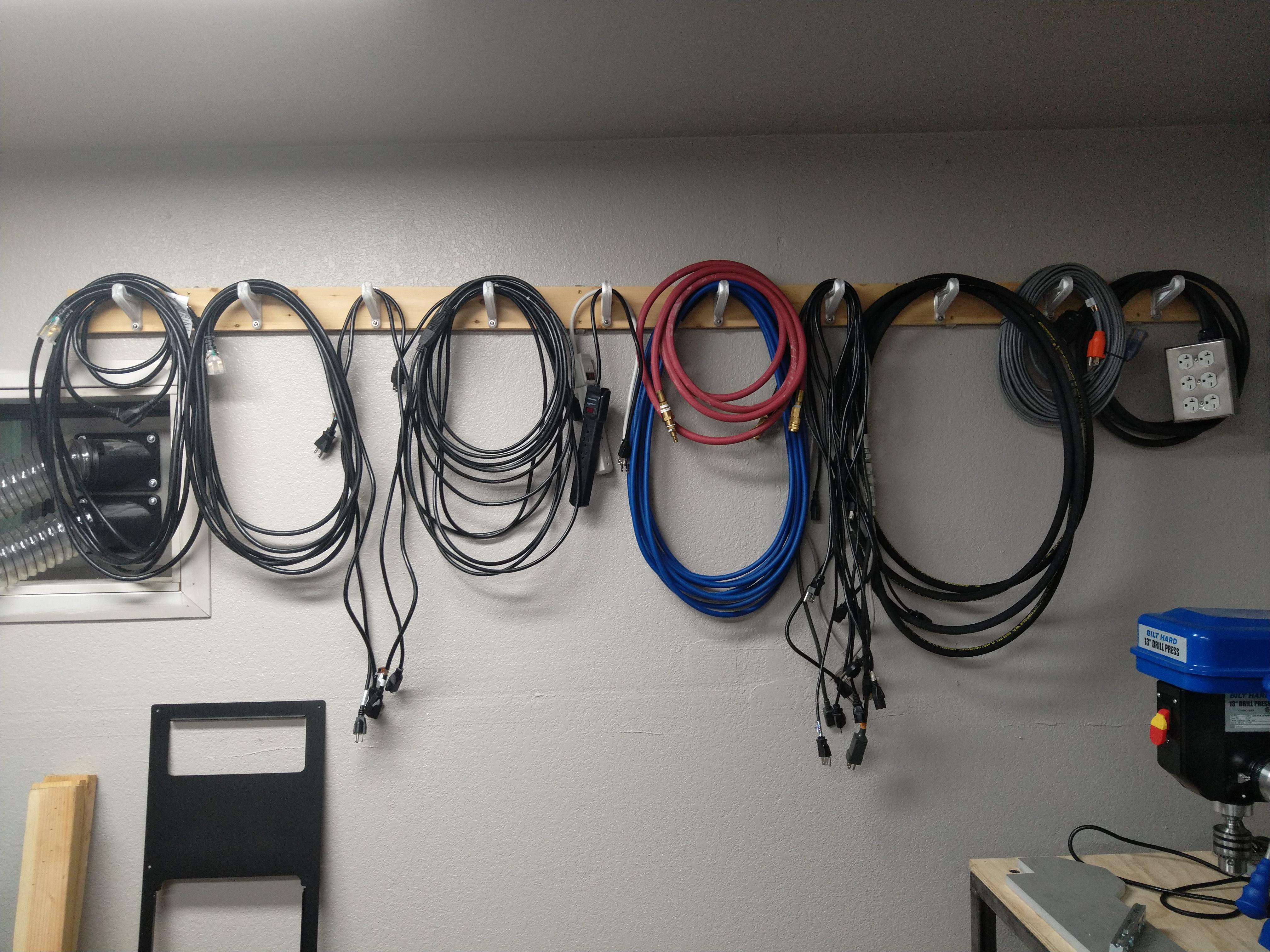 Extension Cord And Hose Holder Scrolller