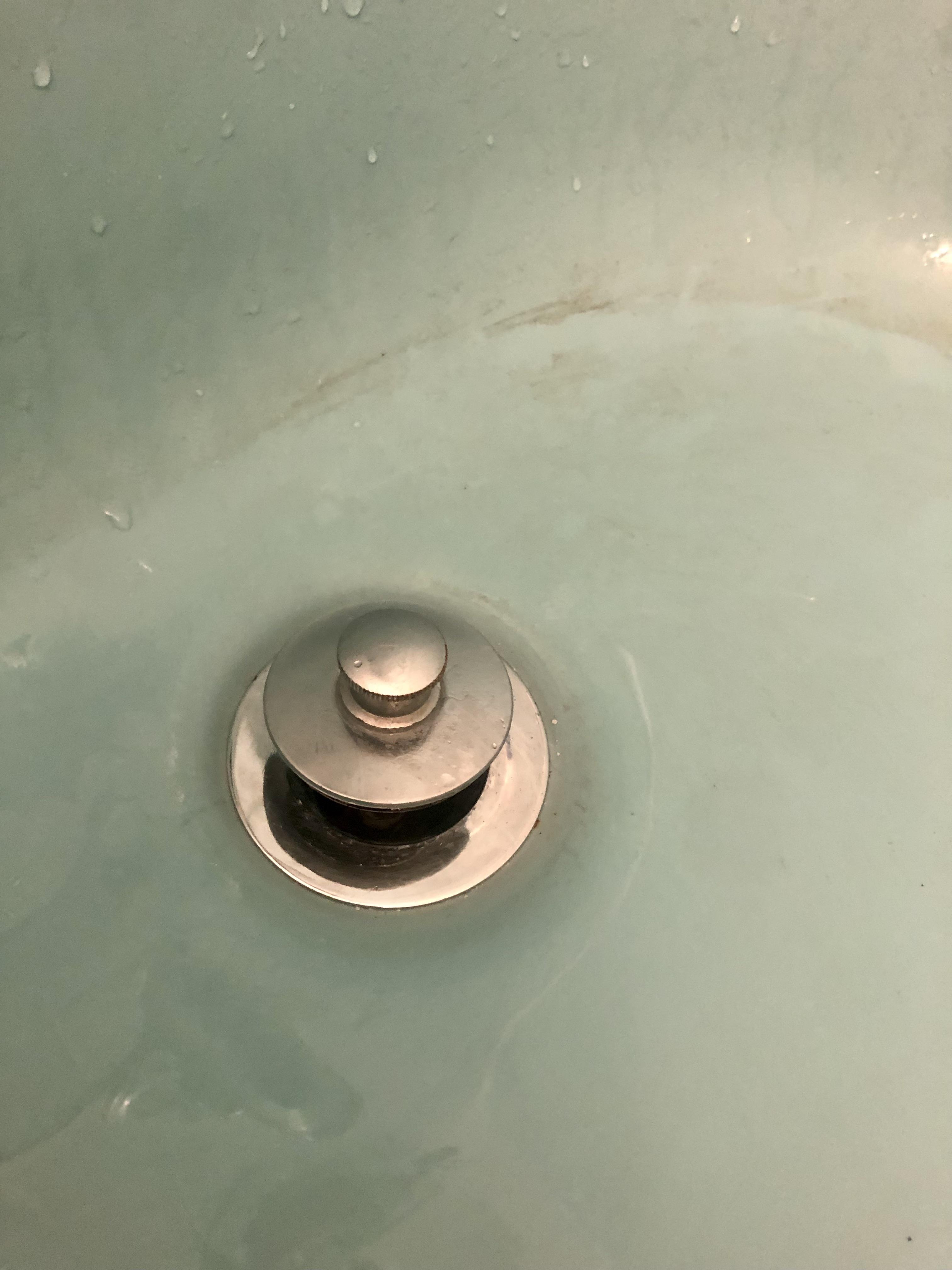 Keeping hair out of the drain Scrolller