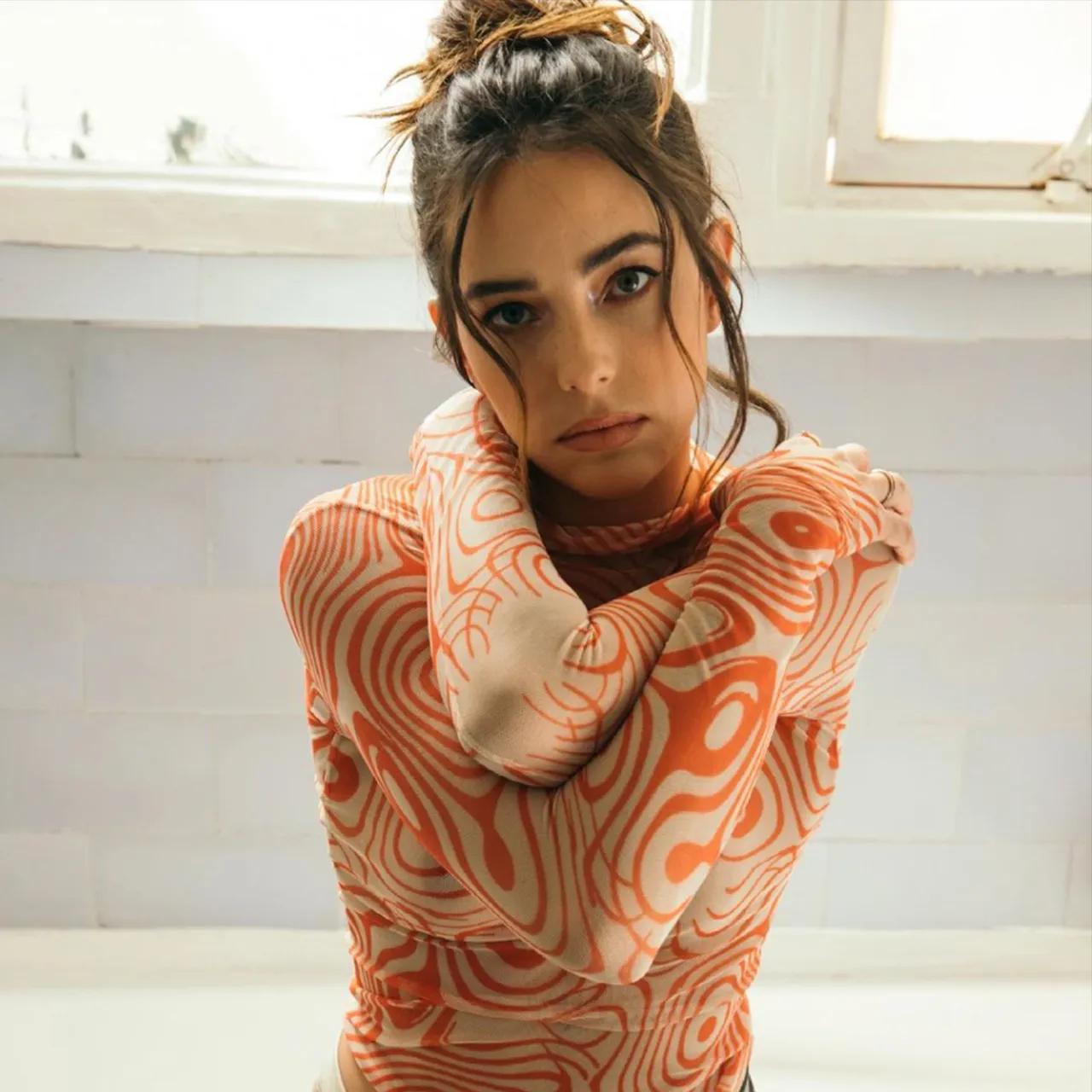 Mariel Molino Scrolller