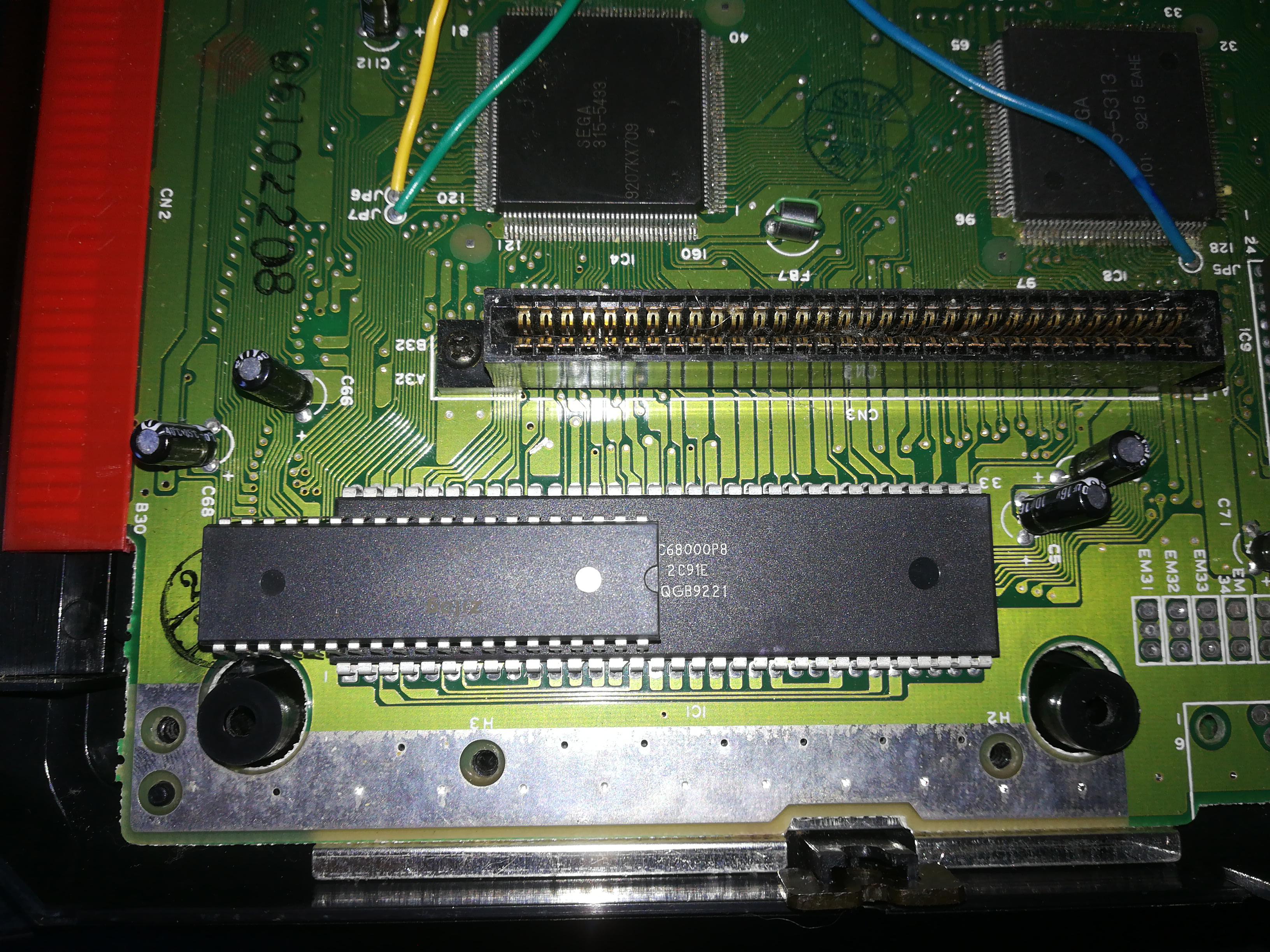 64 pin 68k cpu. Z80 for scale. | Scrolller