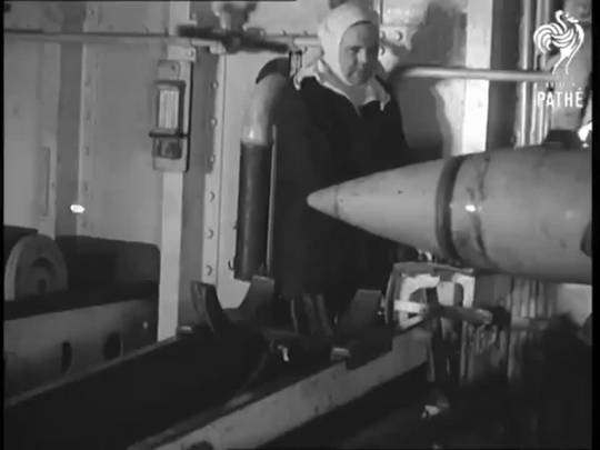 A big load of shells being fed to the guns of the HMS Rodney in 1944 ...