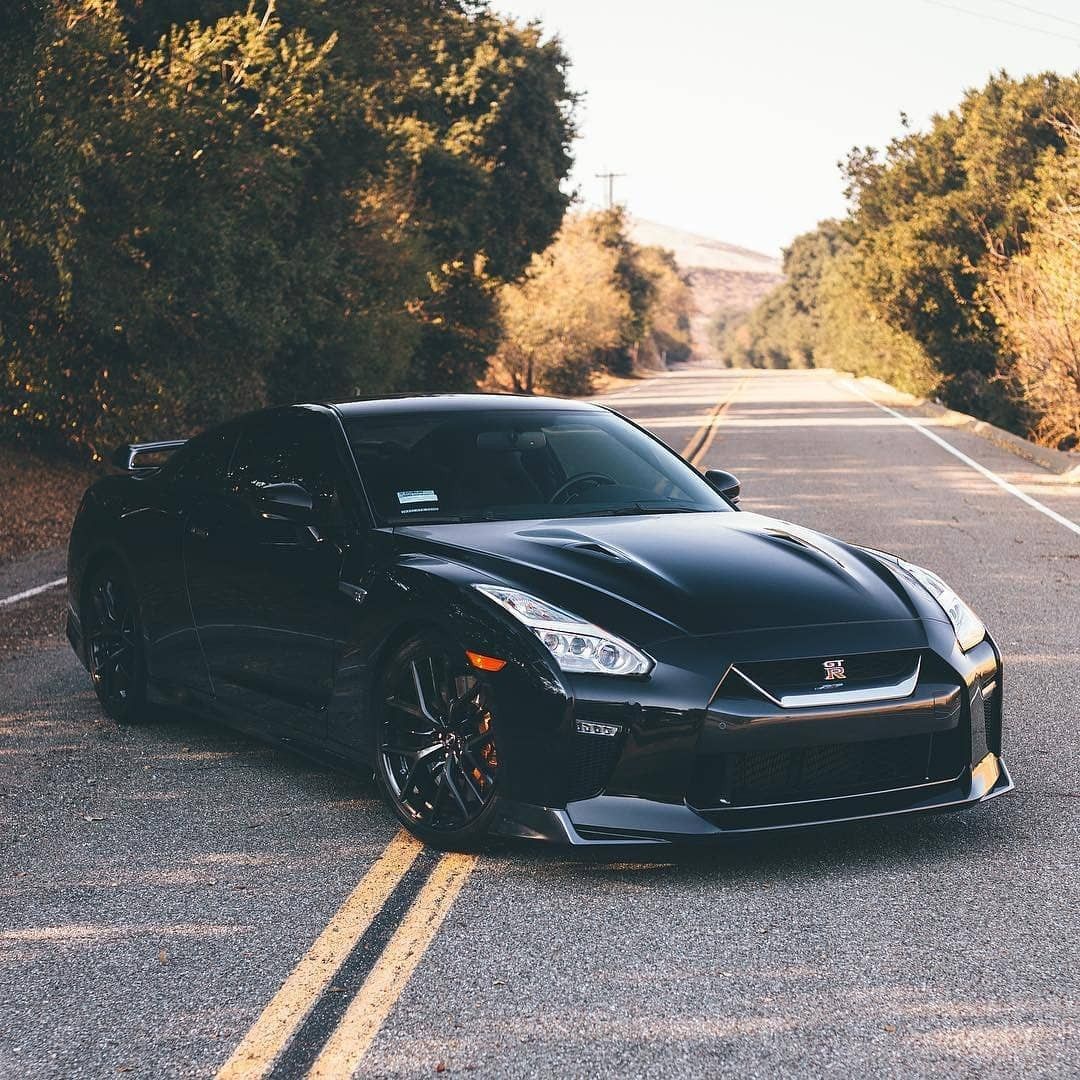 a Nissan GT-R (R35) in full black | Scrolller