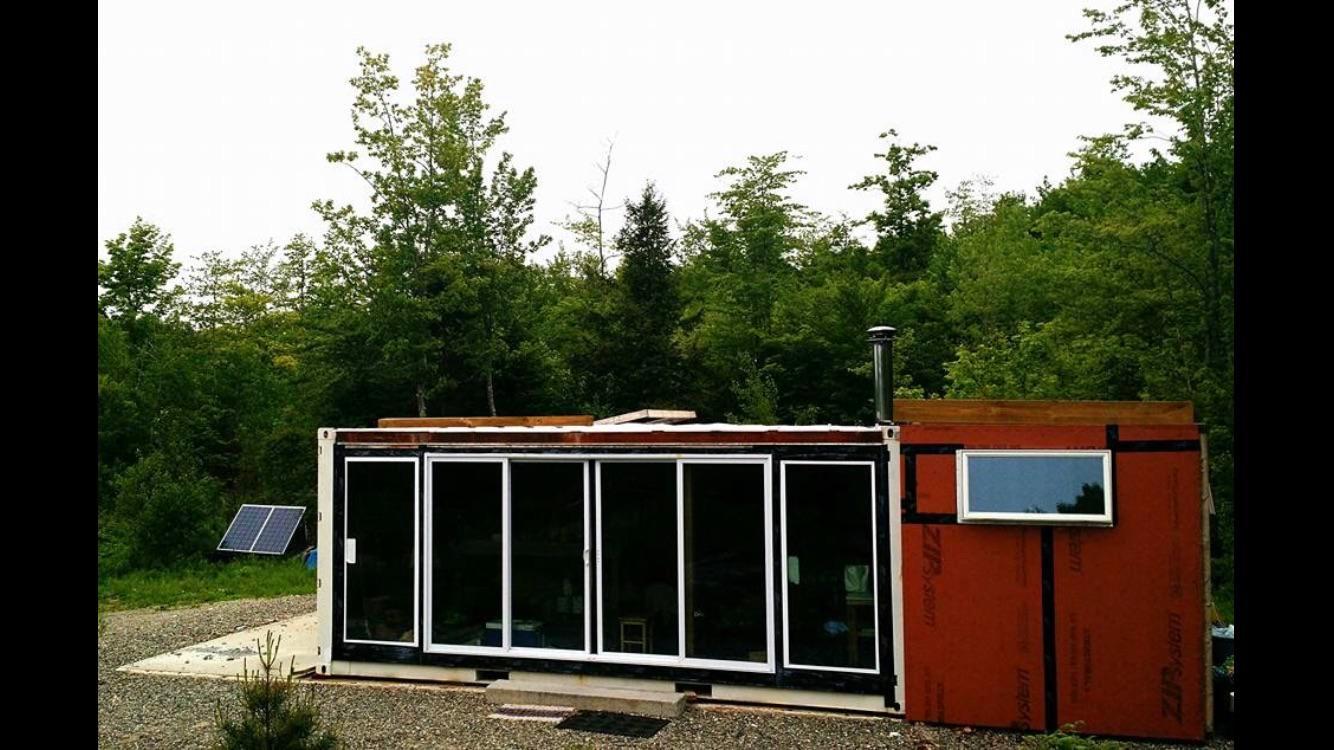 A shipping container cabin I built and lived in for six/seven years totally off grid in the