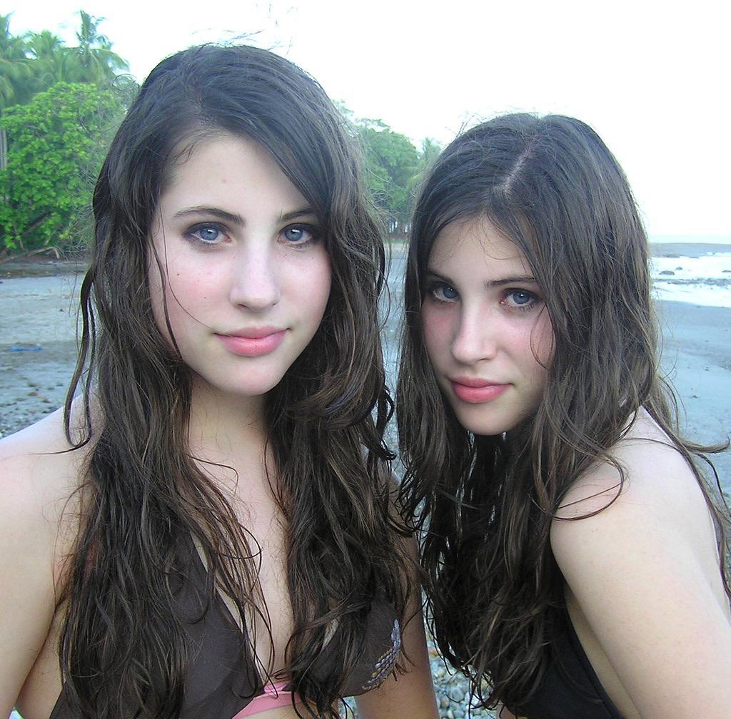 Beautiful Twin Sisters At The Beach Scrolller 2801