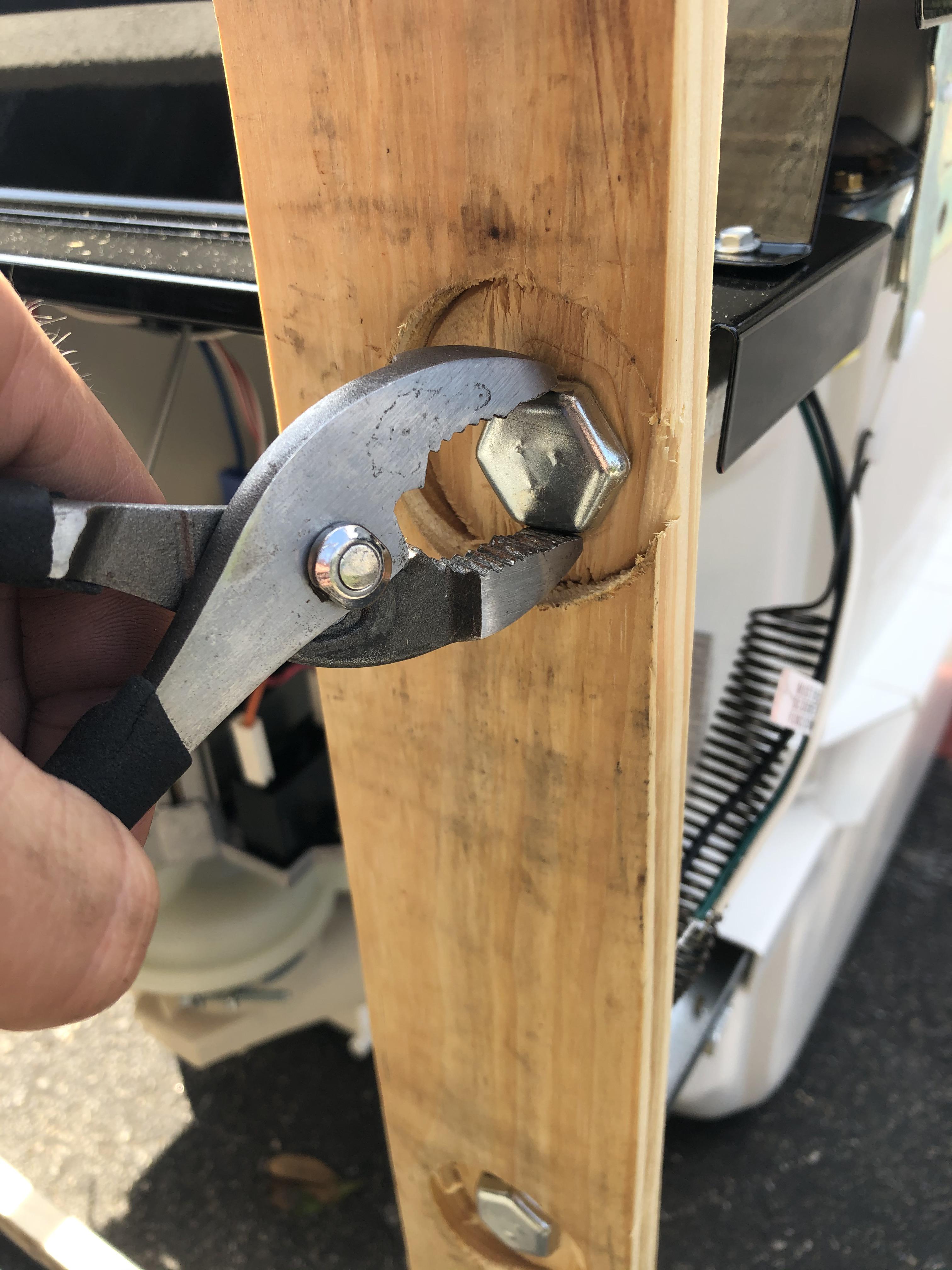 Best tool to remove these dishwasher legs from the crate? So far I use ...