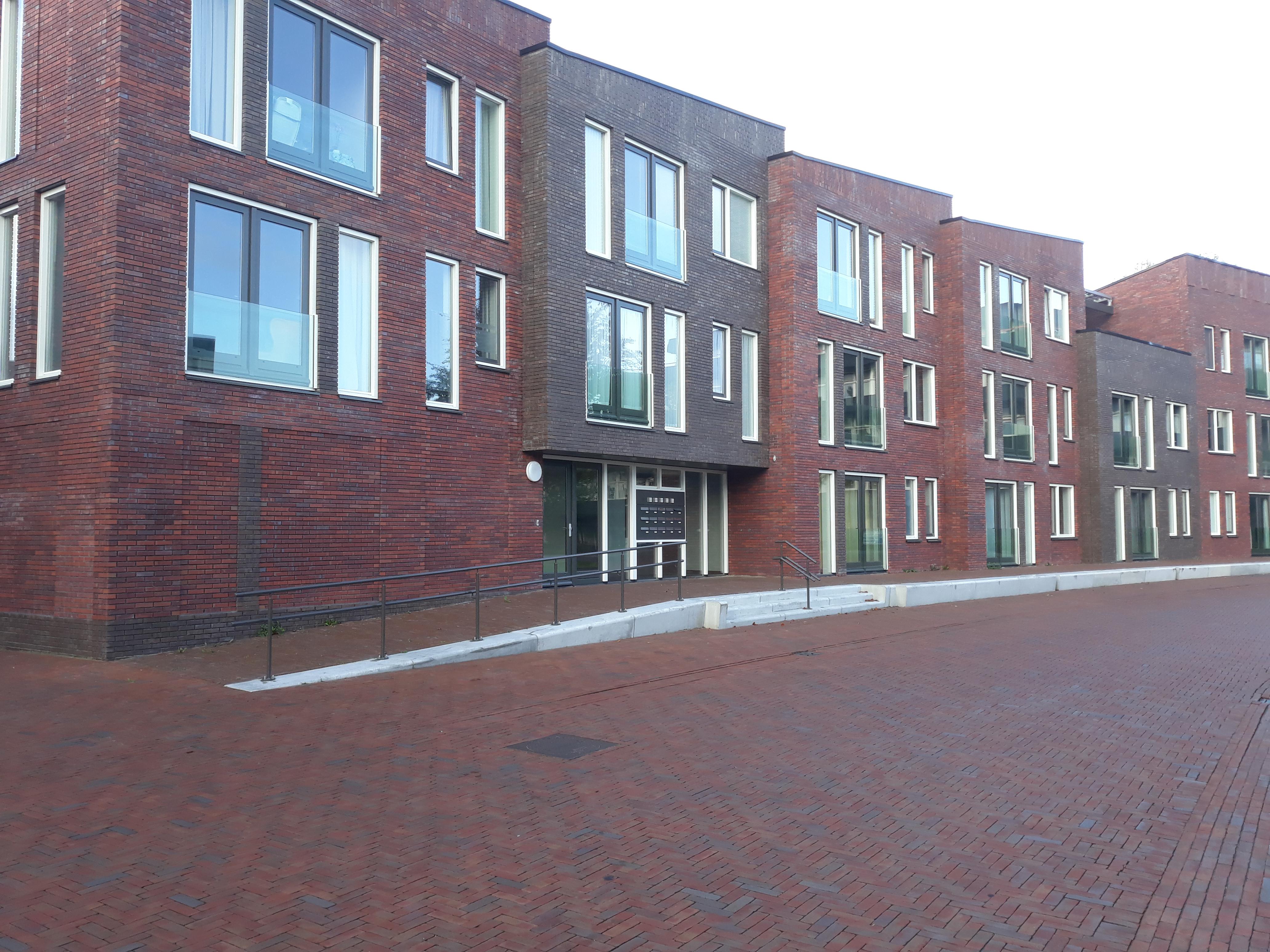 Brick street, brick houses. Delfzijl, the Netherlands Scrolller