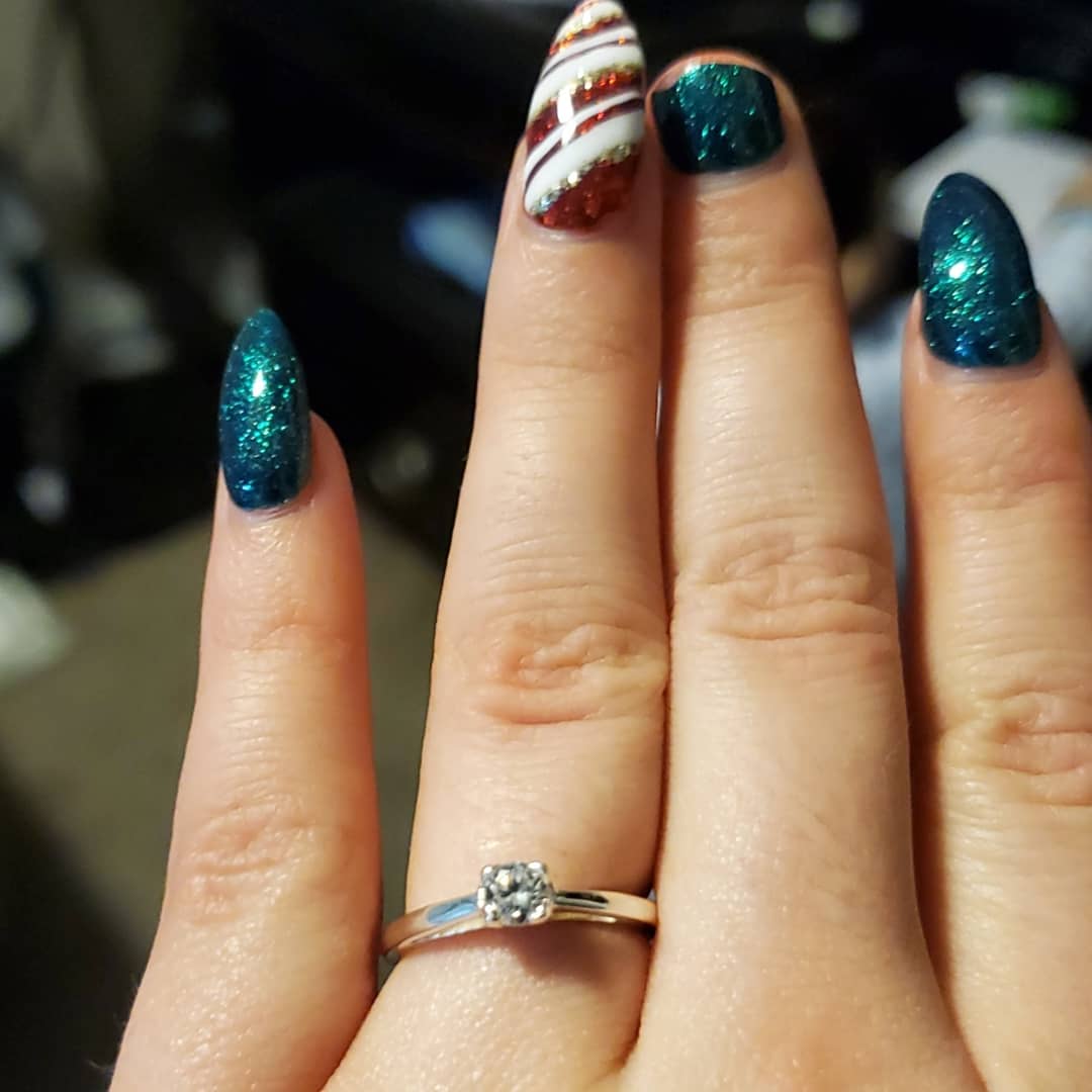 Broke my holiday nails ripping through layers of duct tape and wrapping ...