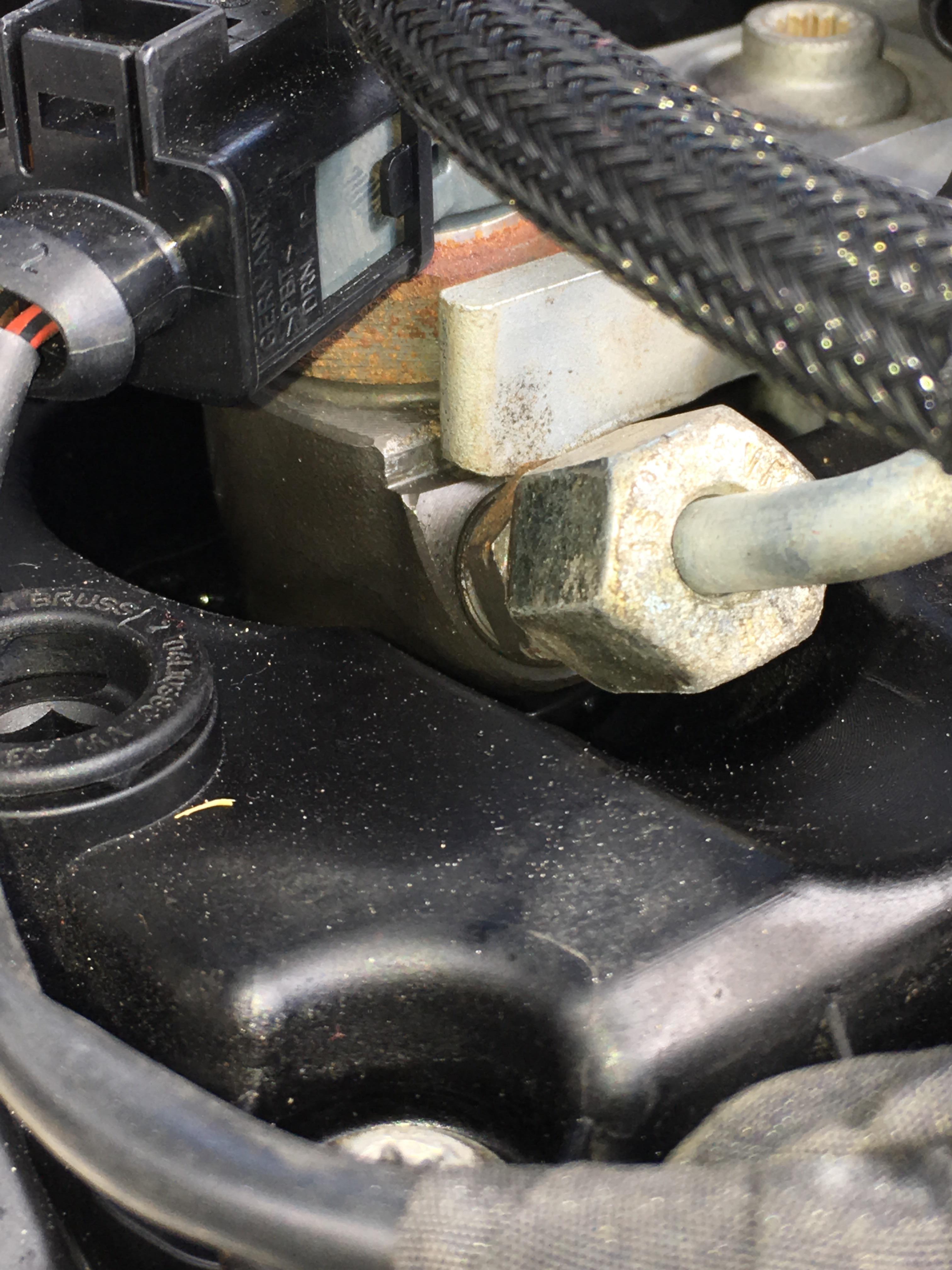 Can you help my dad his engine is leaking gas or oil I’m not sure and