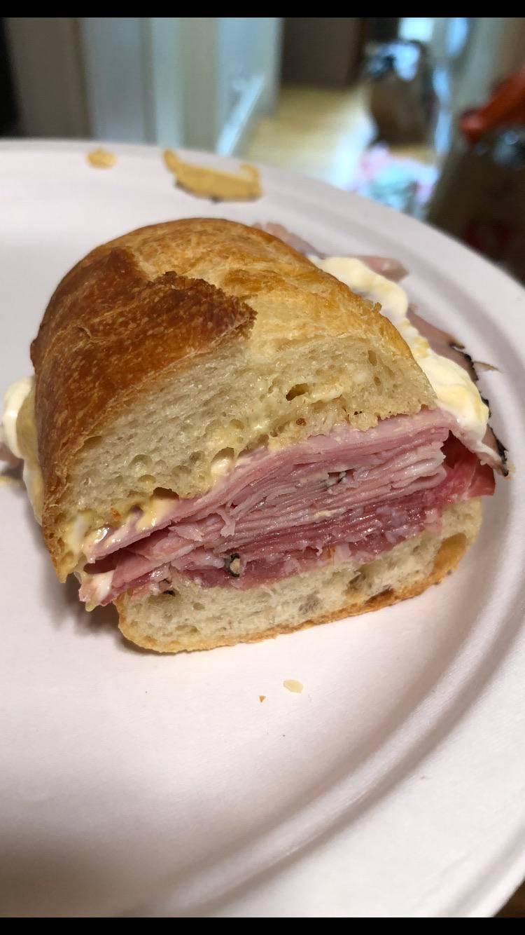Cold cut combo on baguette with Dijon and mayo Ham soppressata