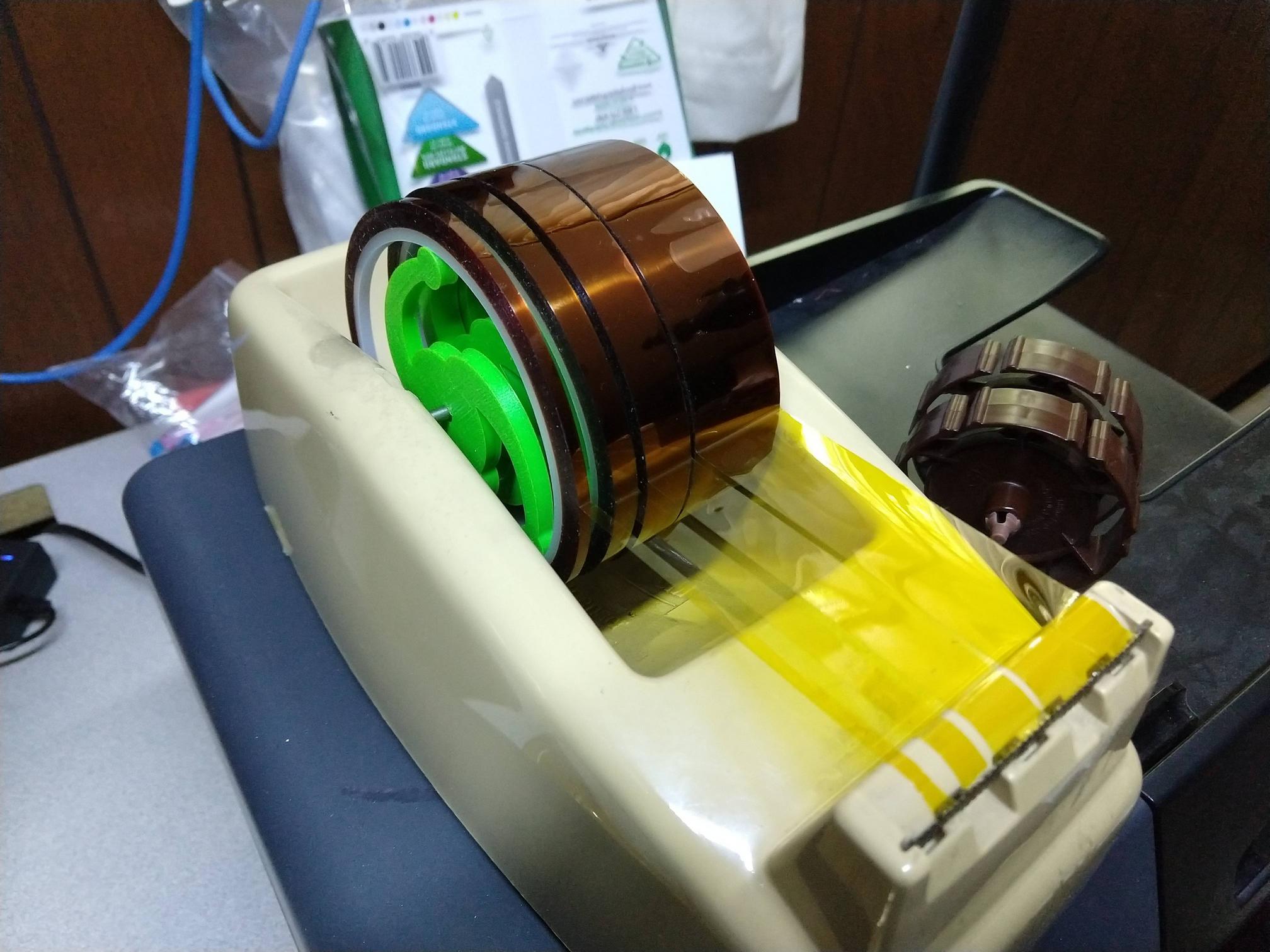 Converted a masking tape dispenser for kapton. Scrolller
