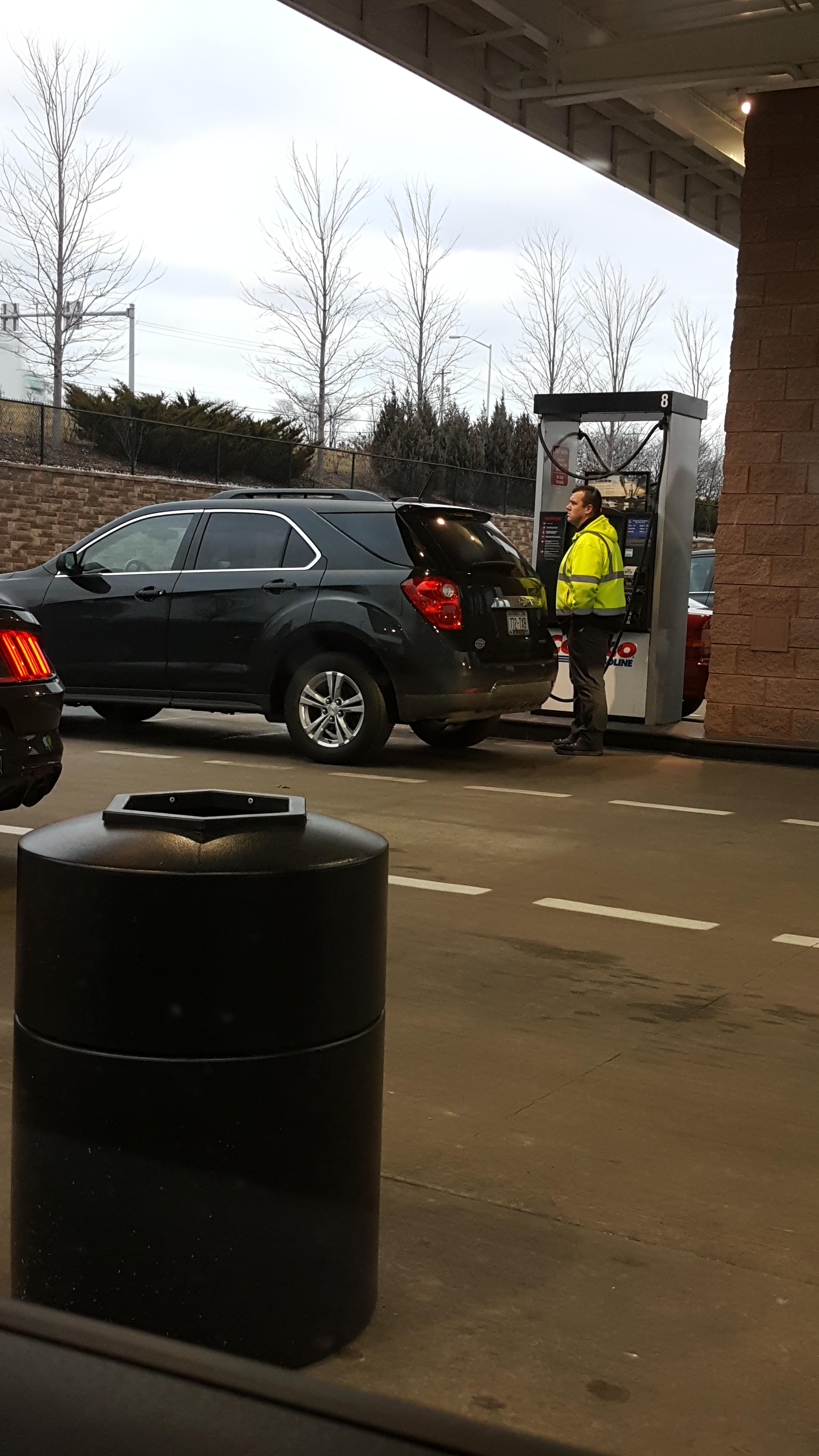 Costco guy pumping gas for a little old lady who had difficulty getting
