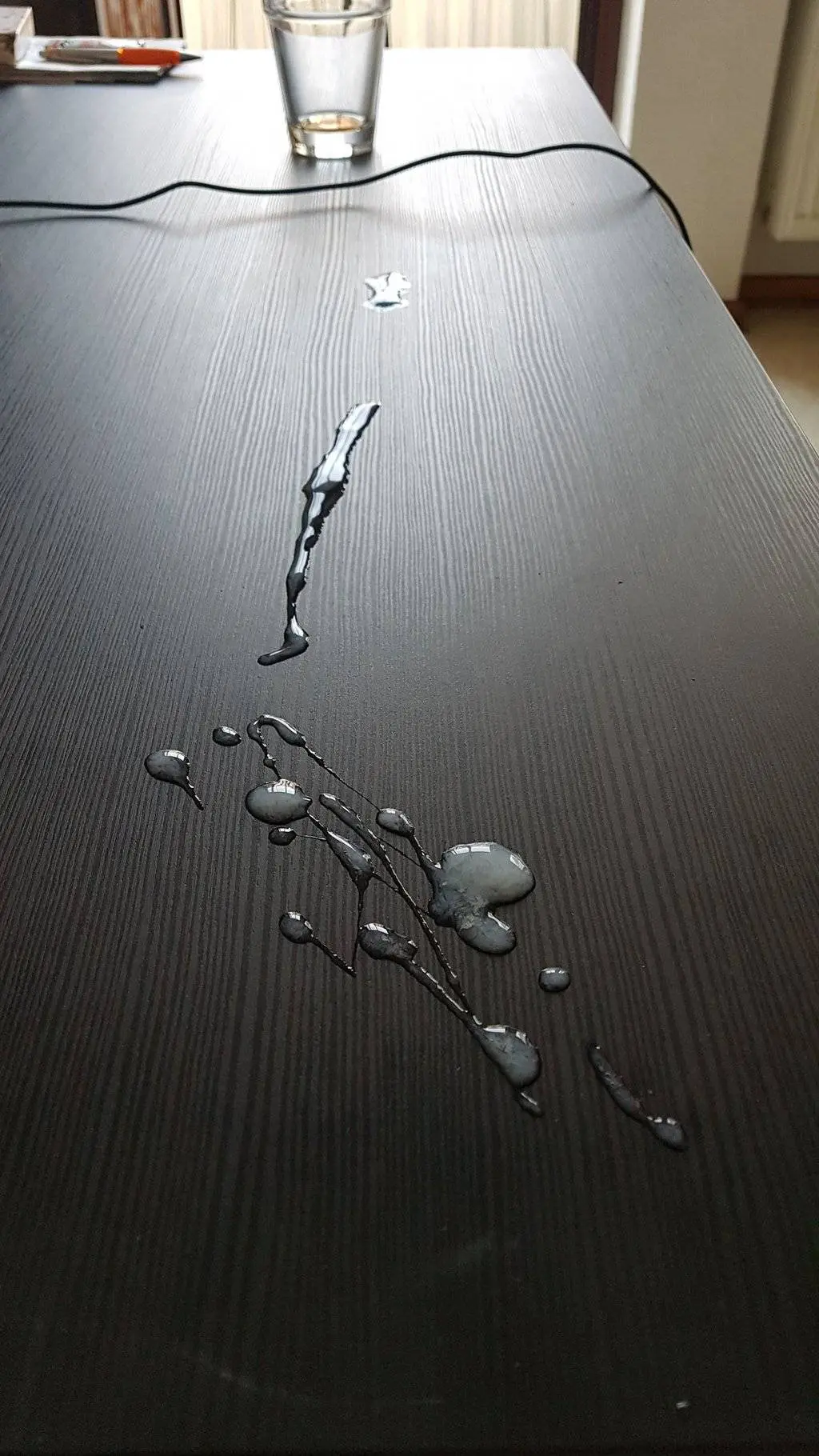Cumshot on the kitchen table