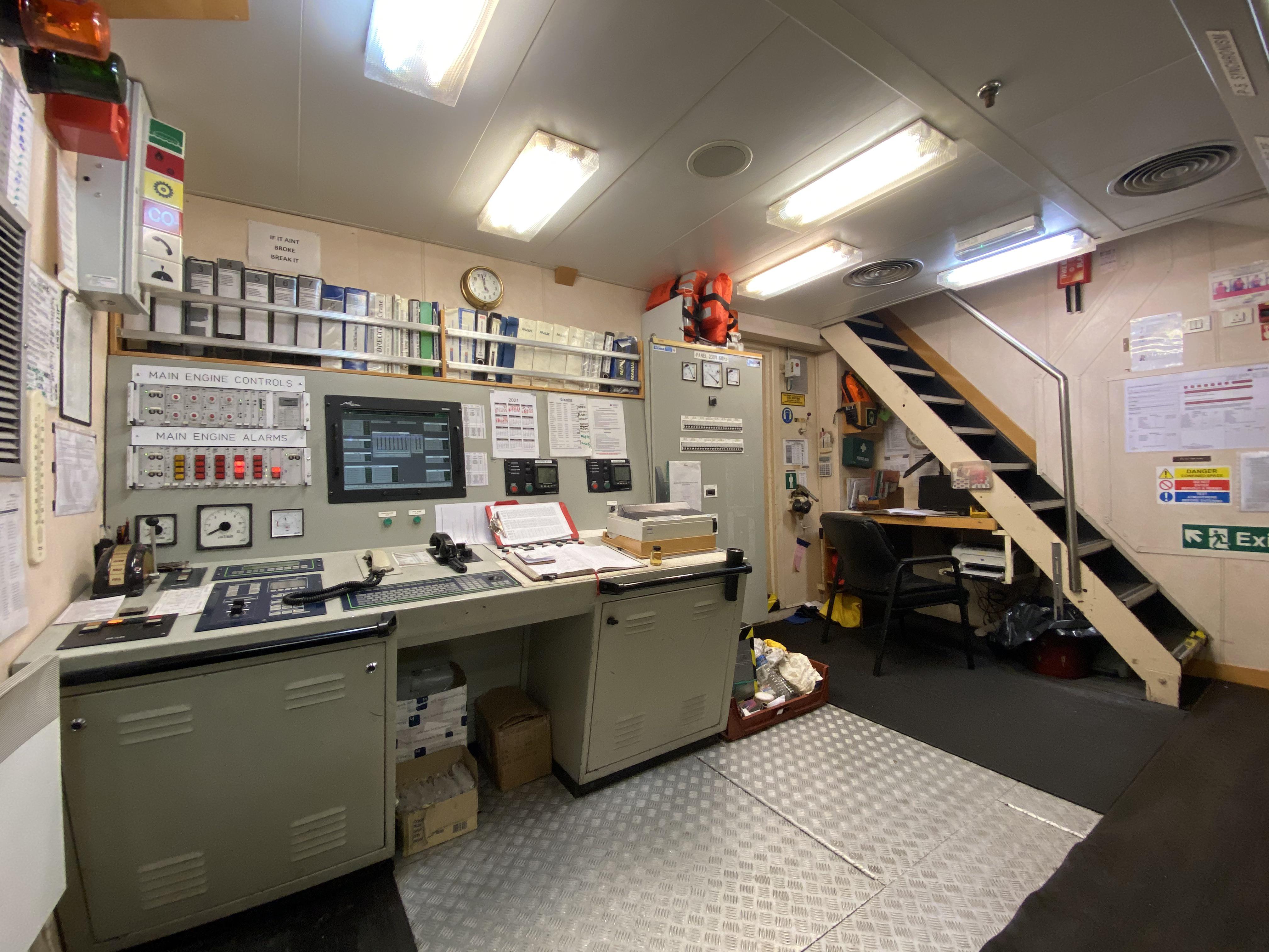 Engine control room of a standby vessel in the North Sea. | Scrolller