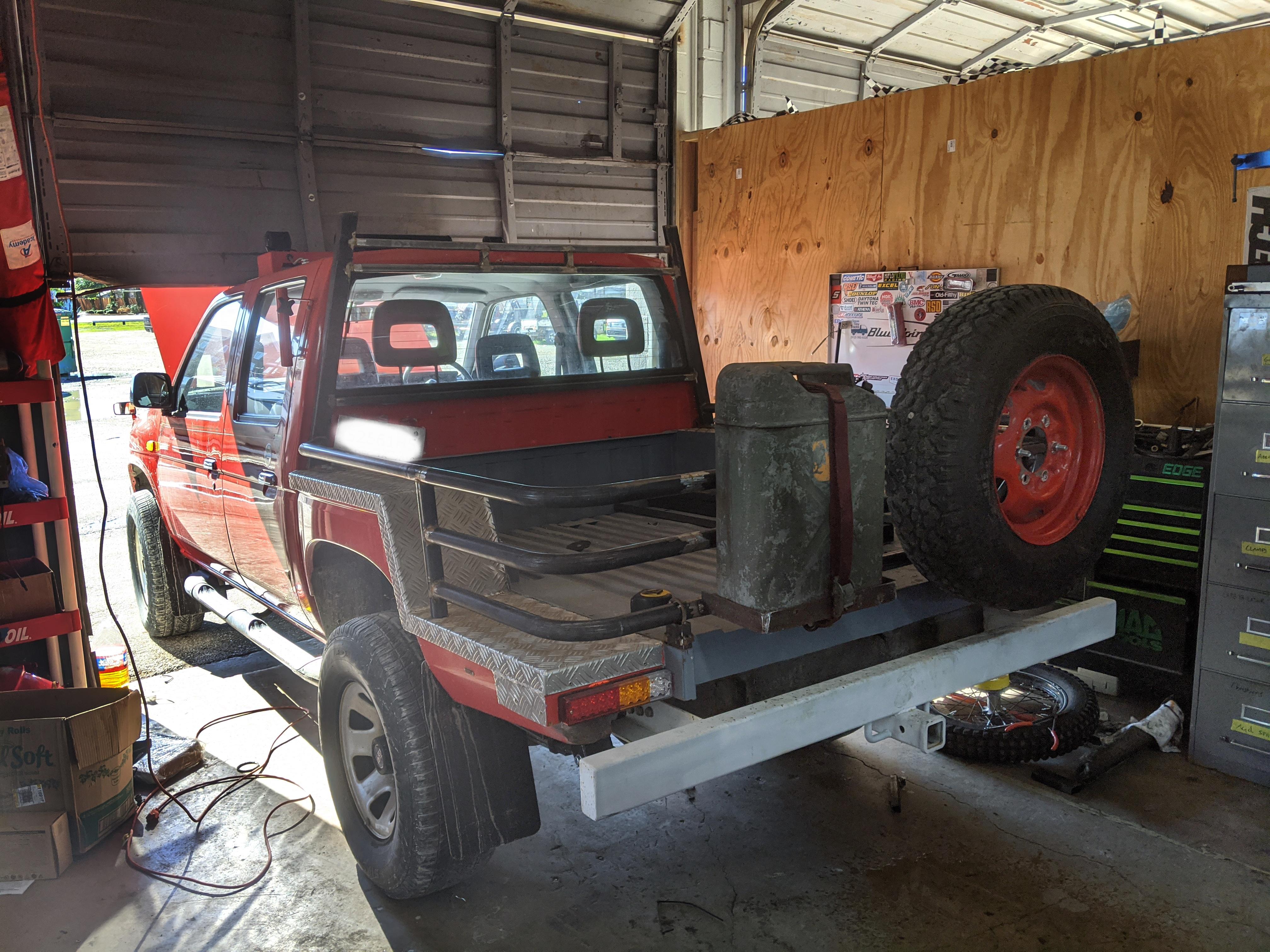 Fixed the headache Rack support and added gas can and spare tire mount