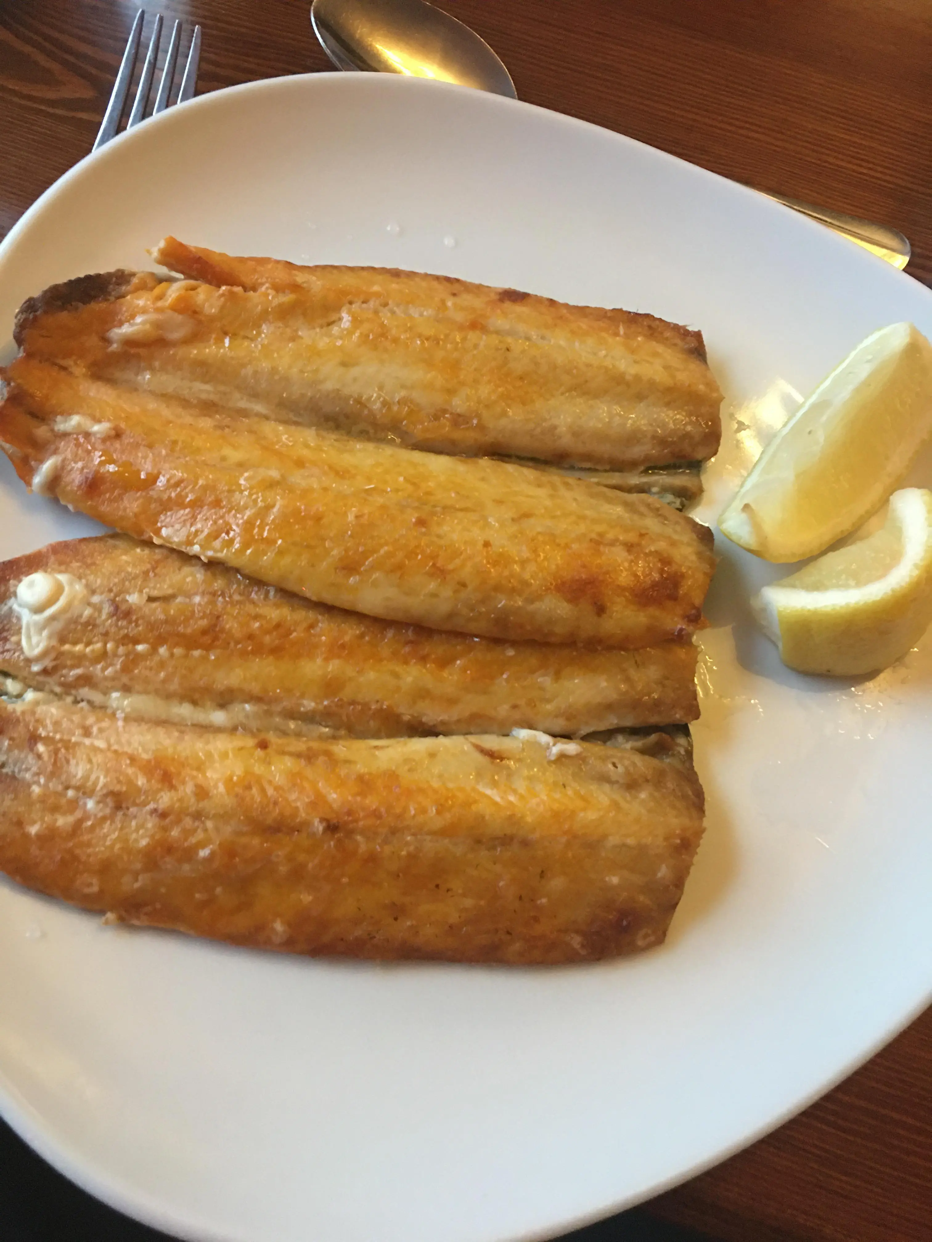Grilled kippers with caper butter and lemon | Scrolller