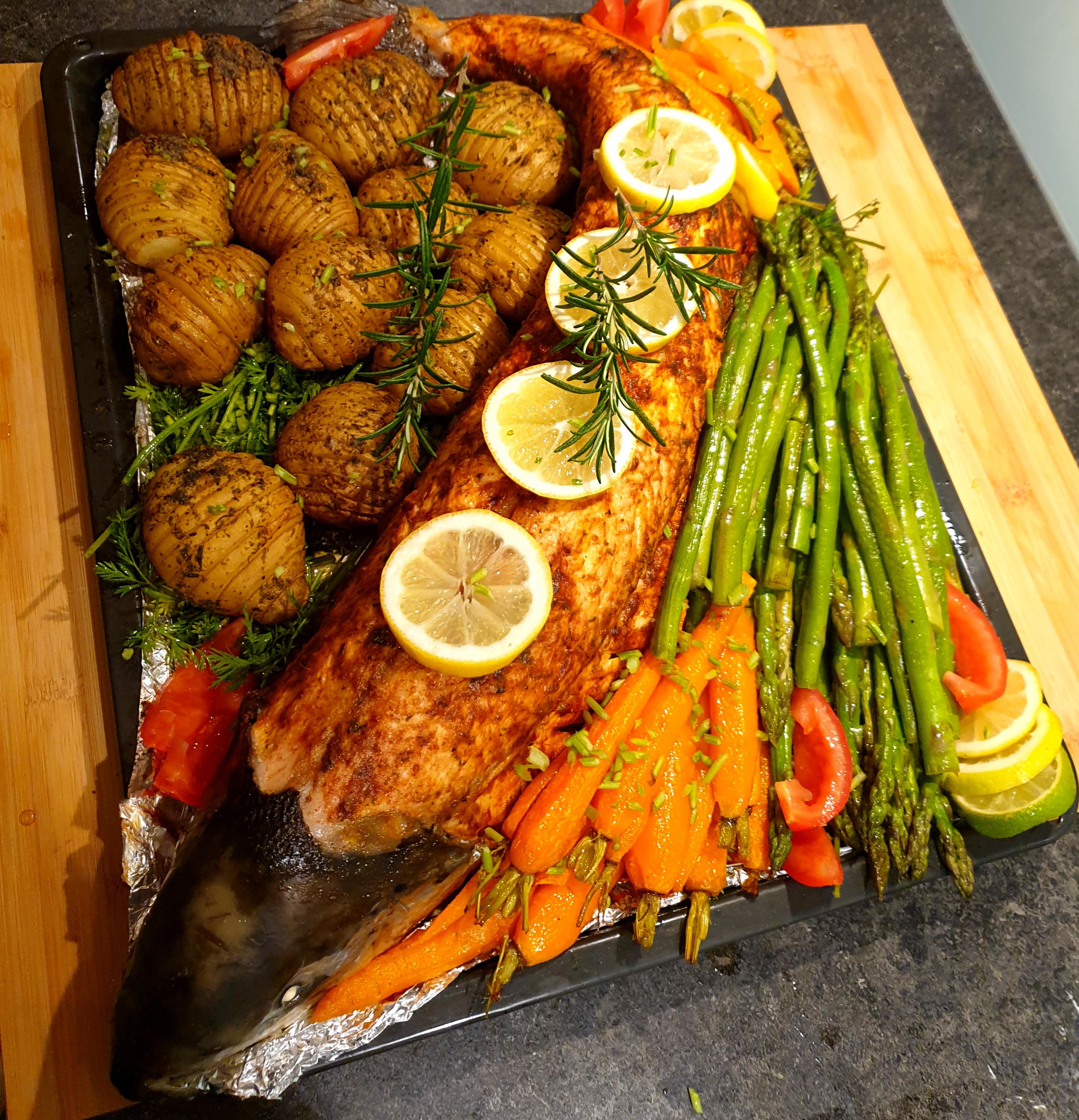 Grilled whole salmon with honey lemon glazed veggies | Scrolller