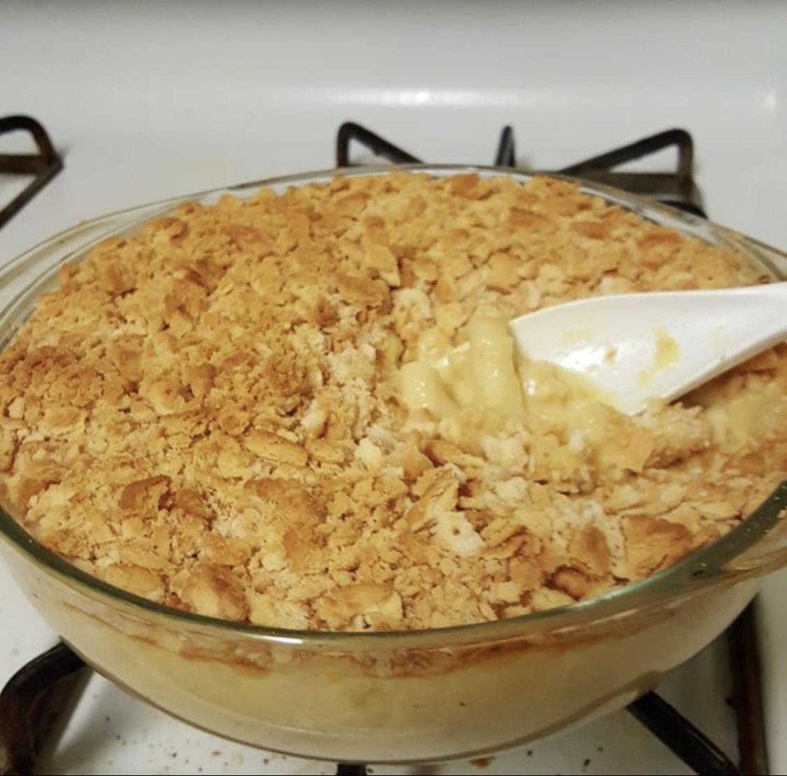 Homemade Mac N Cheese with Ritz crackers crumble topping. It won't let