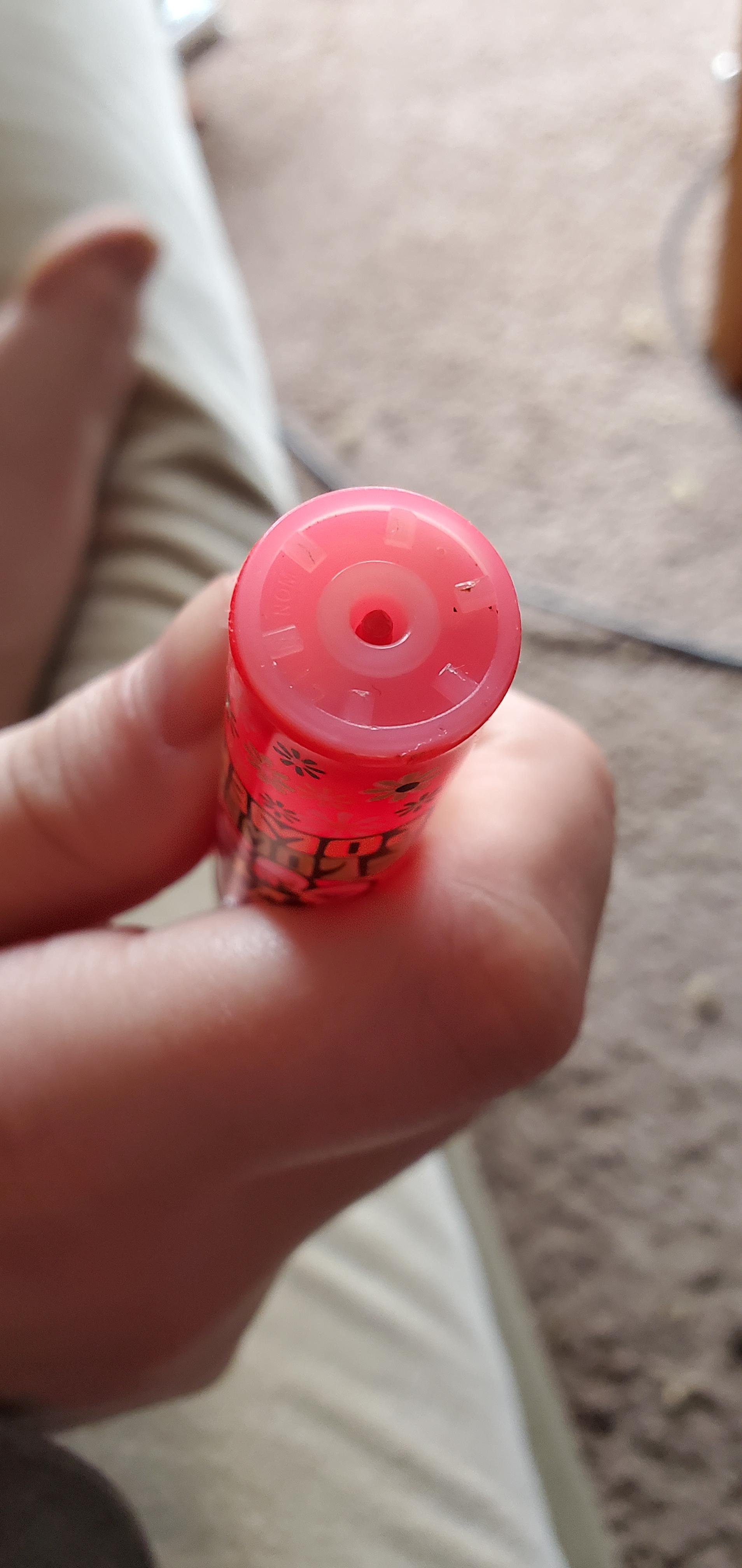 how do I refill this lighter? it doesn't have the metal circle that my