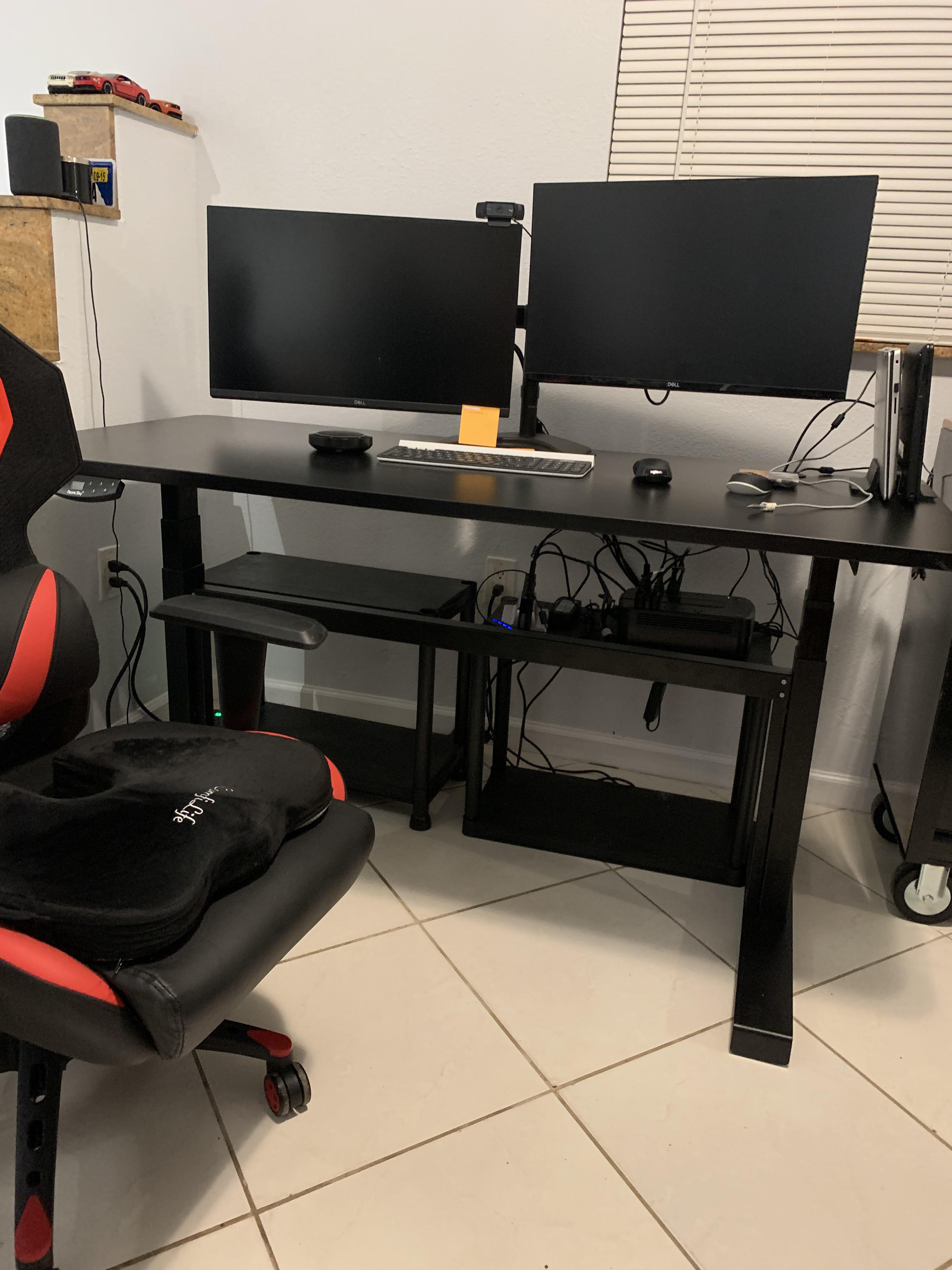 How see you managing the cables under your desk? What a mess, even with cable ties. Scrolller