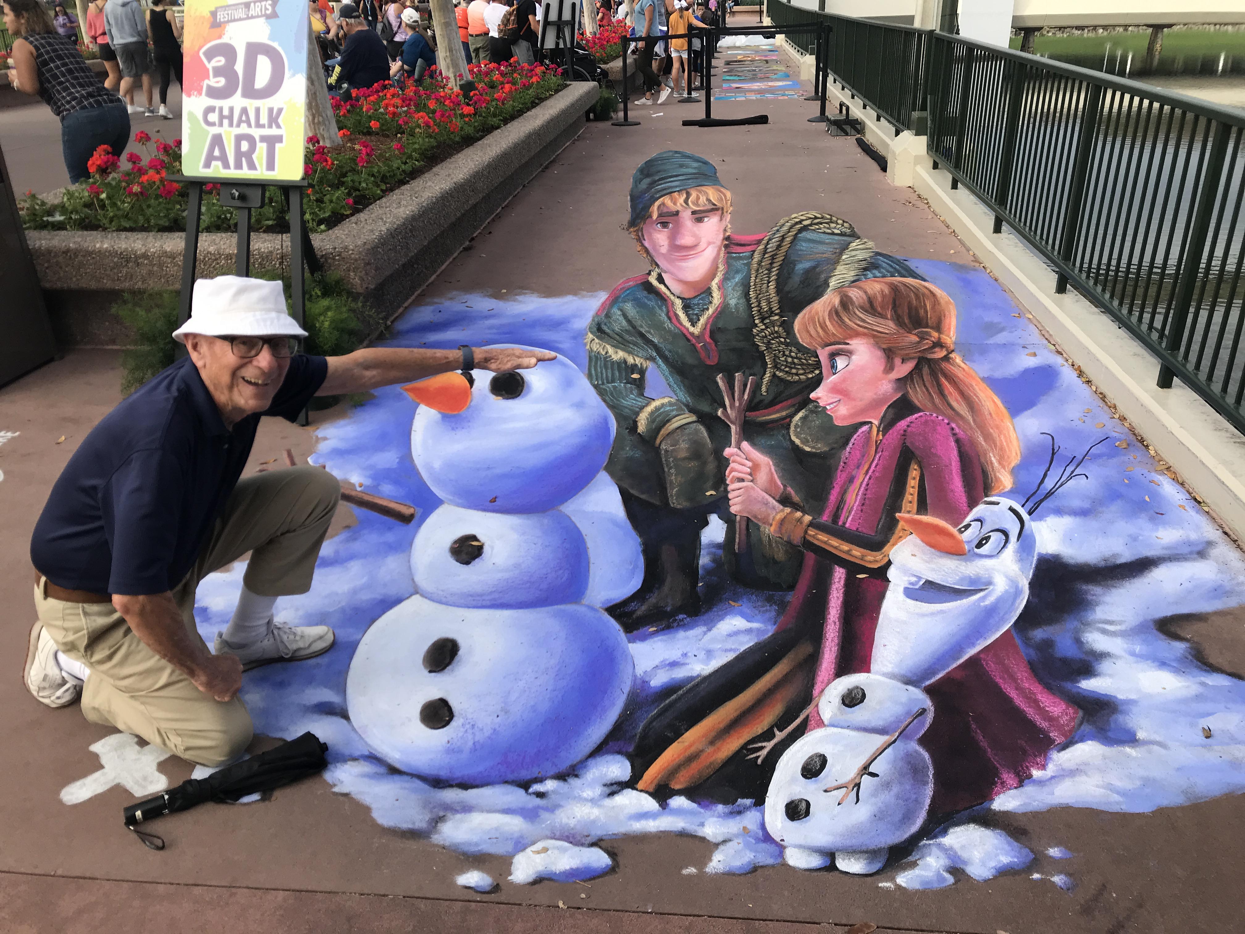 I made some 3D chalk art at Disney where people could look like they're