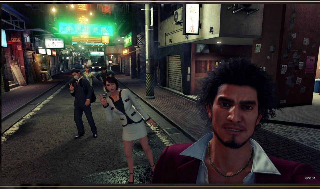 In yakuza 7, random passerbys will pose if they see you taking photos