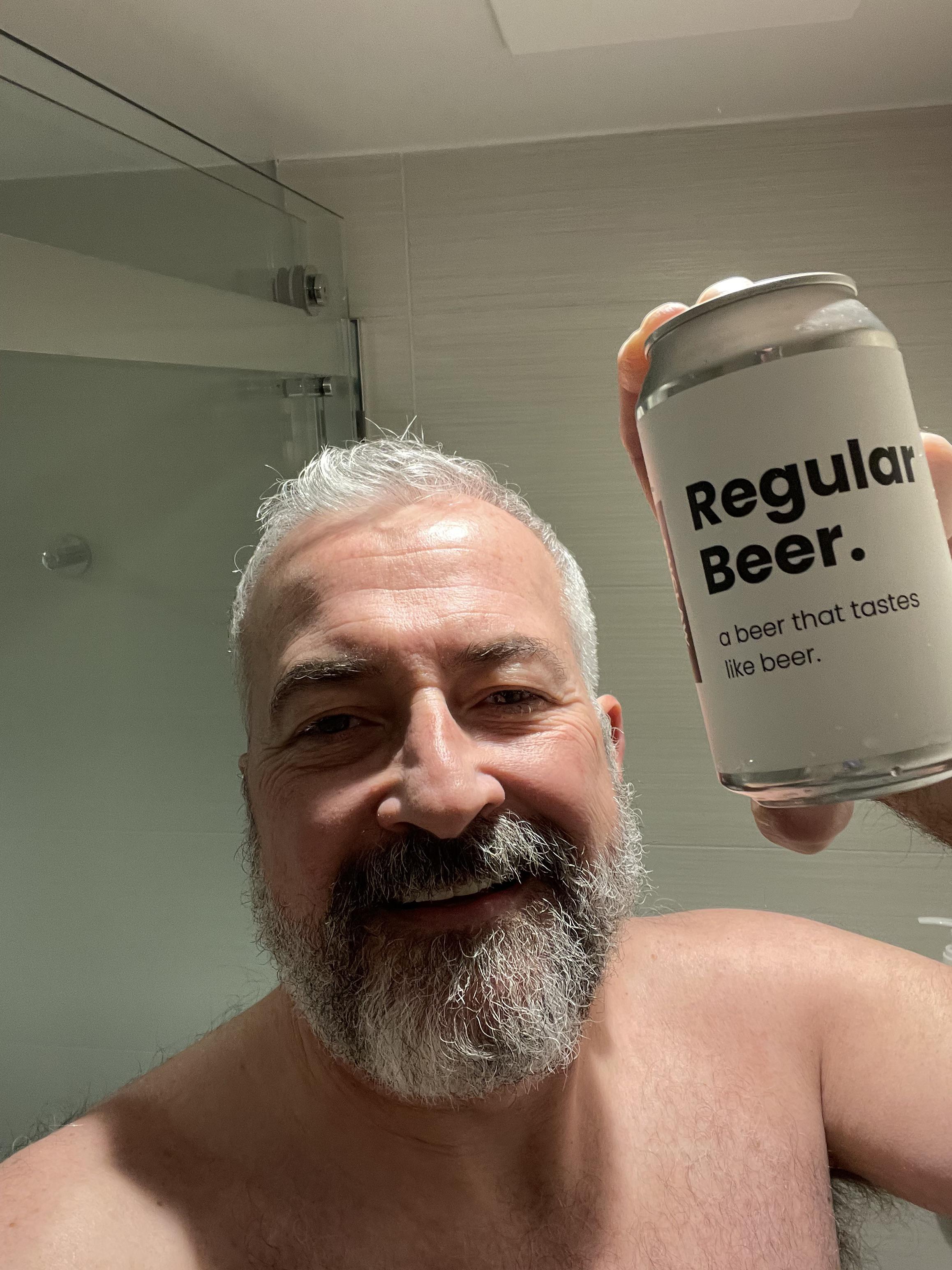 Just a regular guy, enjoying a regular beer in a regular shower after a